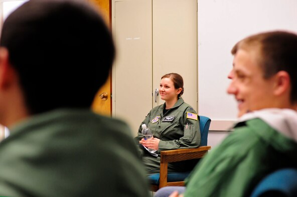 First Lt. Diana Dillard, 8th Airlift Squadron pilot, listens to questions from students of nearby Emerald Ridge High School March 11, 2011, at Joint Base Lewis-McChord, Wash. Lieutenant Dillard graduated from the high school in 2004, and hosted the school’s recent visit to McChord Field. (U.S. Air Force Photo/Adamarie Lewis-Page) 