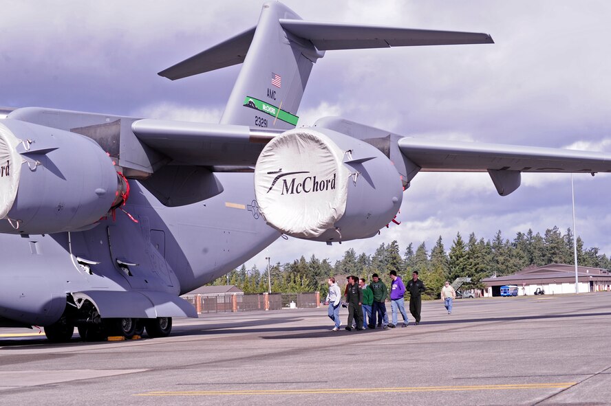 Students of Emerald Ridge High School tour the McChord Field flight line March 11, 2011, at Joint Base Lewis-McChord, Wash. Pilots from the 8th Airlift Squadron gave the students a tour of McChord Field to coincide with their aviation magnet program. (U.S. Air Force photo/Adamarie Lewis-Page)