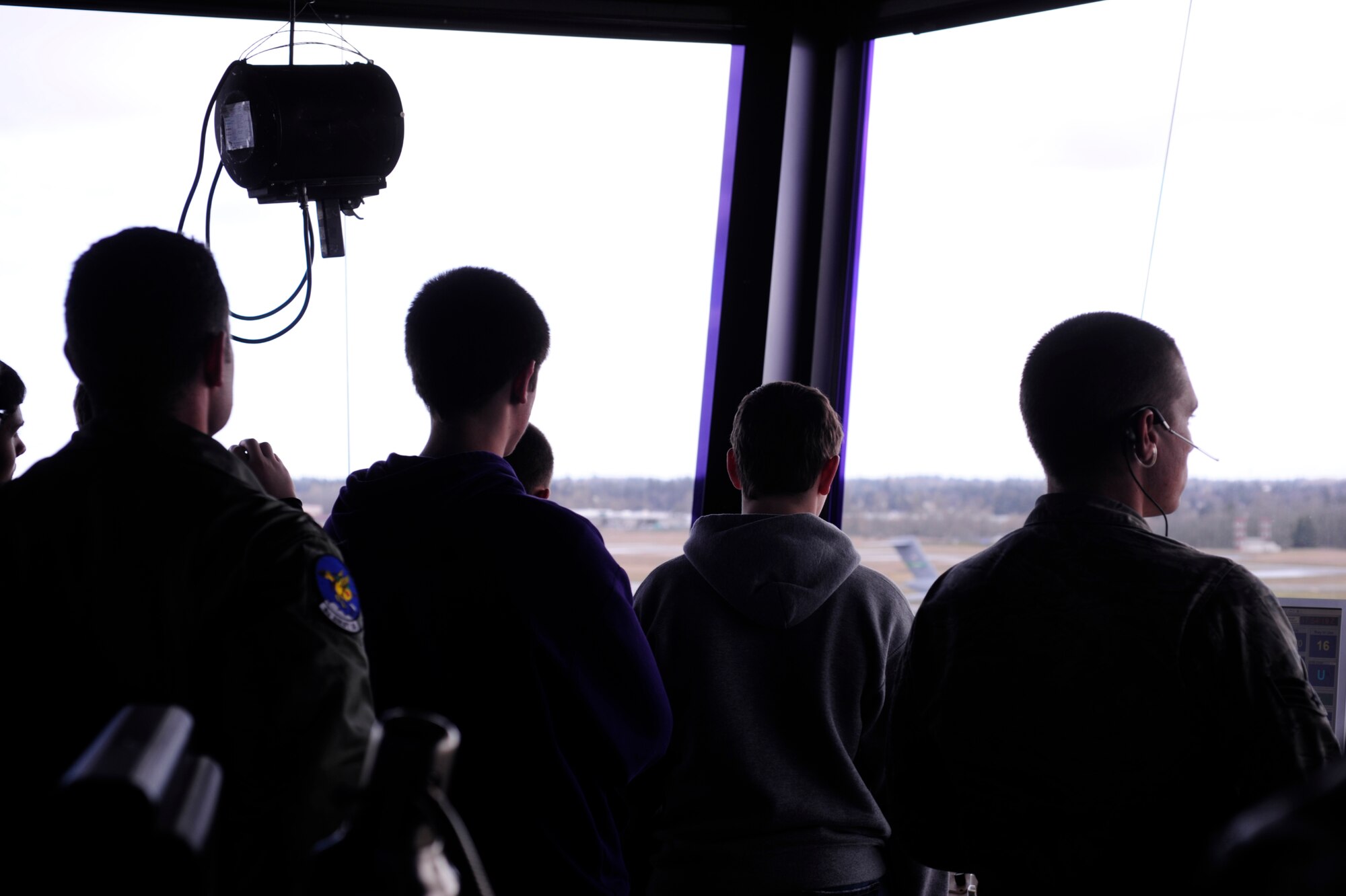 Students of Emerald Ridge High School tour the McChord Field air traffic tower March 11, 2011, at Joint Base Lewis-McChord, Wash. They also visited a static display, observed an aircraft maintenance inspection and experienced C-17 Globemaster III training in the simulator. (U.S. Air Force photo/Adamarie Lewis-Page)