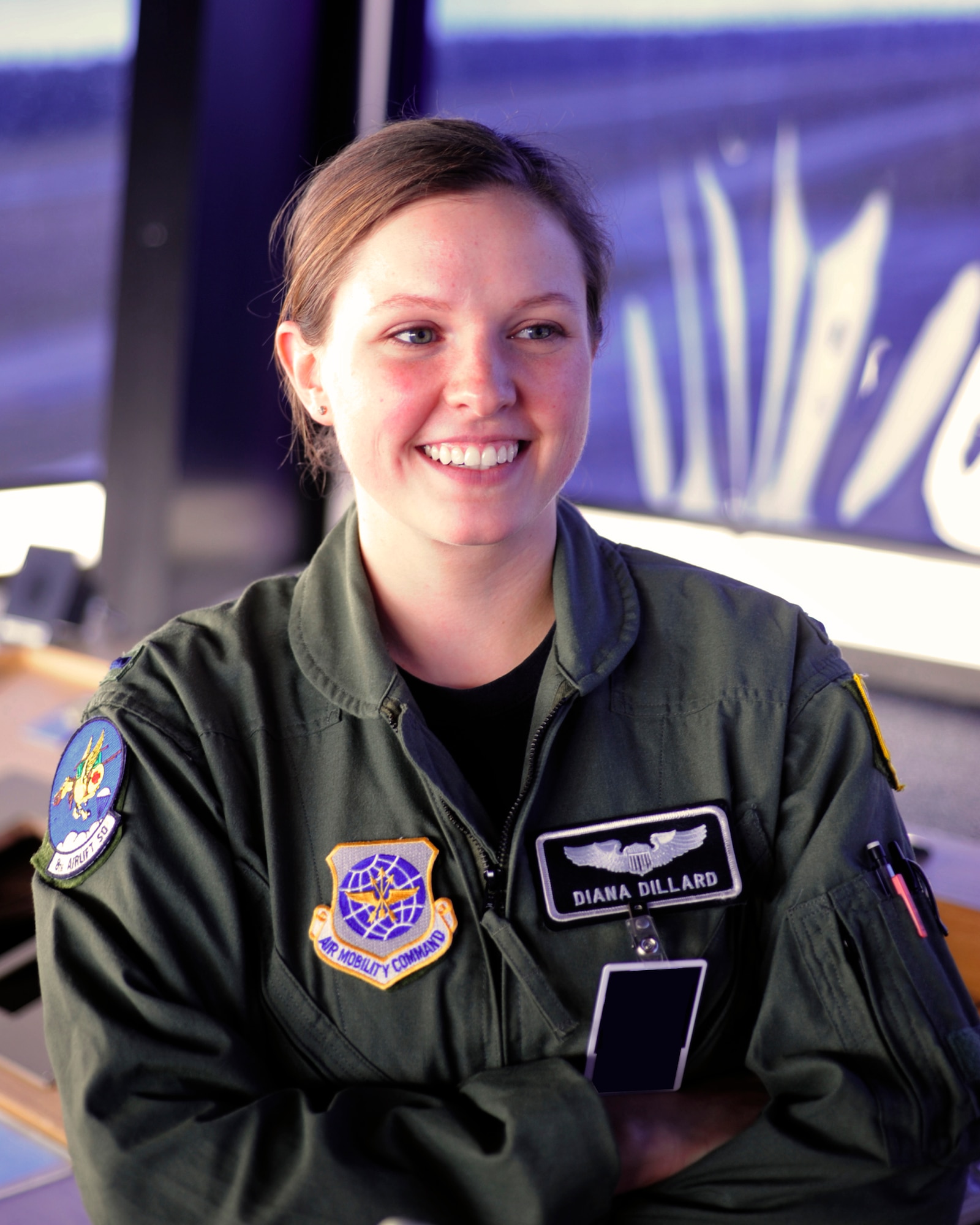 1st Lt. Diana Dillard, 8th Airlift Squadron pilot, gives students of Emerald Ridge High School a tour of the air traffic control tower March 11, 2011, at Joint Base Lewis-McChord, Wash. Lieutenant Dillard grew up in Puyallup, Wash., and graduated from the high school in 2004. She and her fellow 8th AS pilots hosted the school’s visit. (U.S. Air Force illustration/Adamarie Lewis-Page)