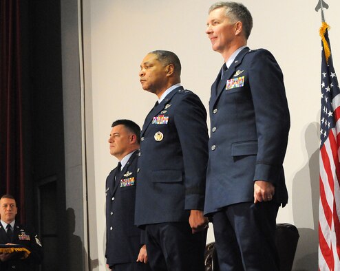 Col. Peter Stavros, left, Maj. Gen. Garry Dean, center and Col. Paul Gruver, right, stand at attention during the Western Air Defense Sector change of command ceremony March 4, 2011, at Joint Base Lewis-McChord, Wash. 
