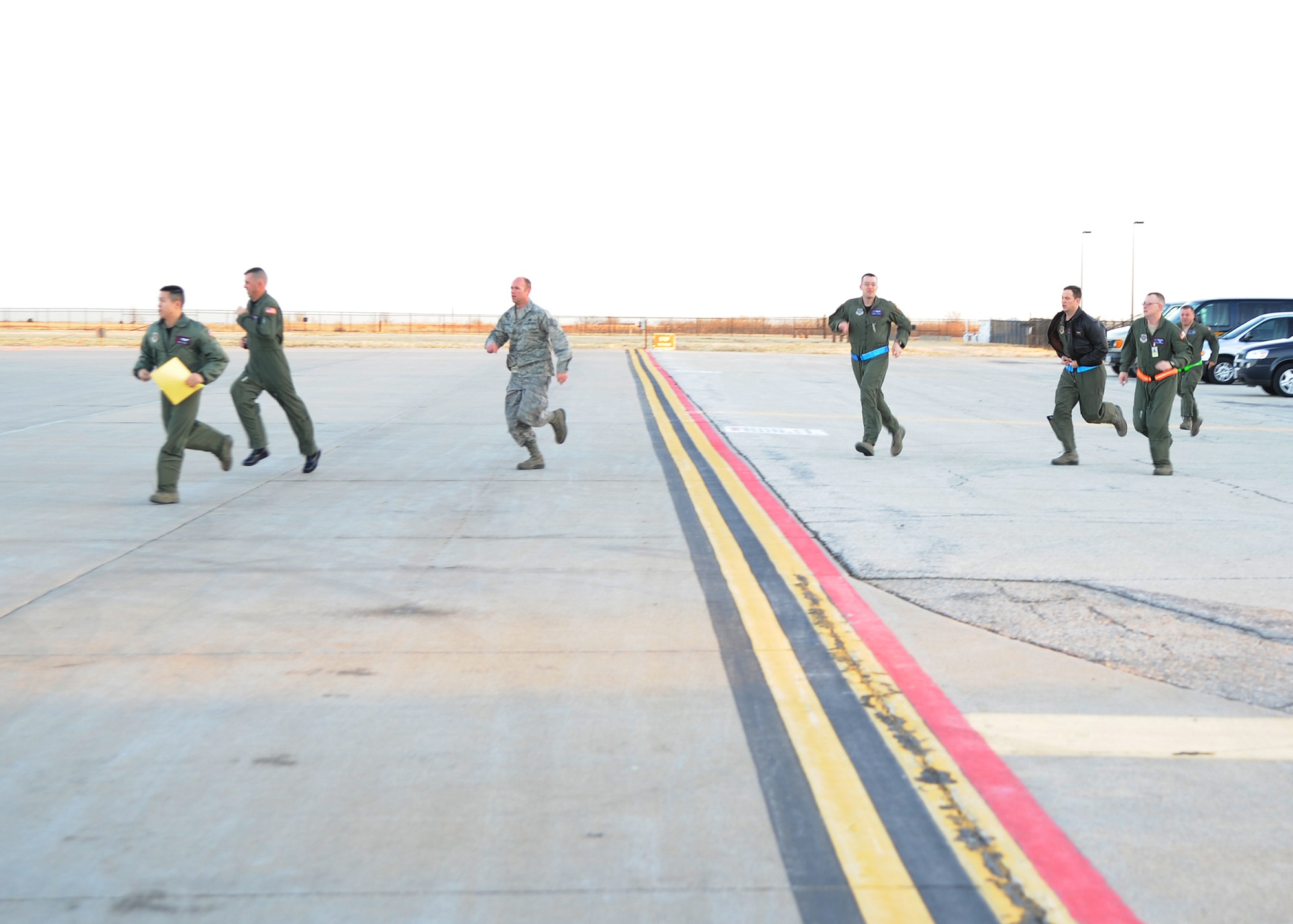 Team McConnell aircrew members respond to a “no notice” alert during a readiness exercise March 11, 2011, McConnell Air Force Base, Kan. The exercise tests the crewmembers ability to quickly and safely mobilize. (U.S. Air Force photo/Airman 1st Class Katrina M. Brisbin)