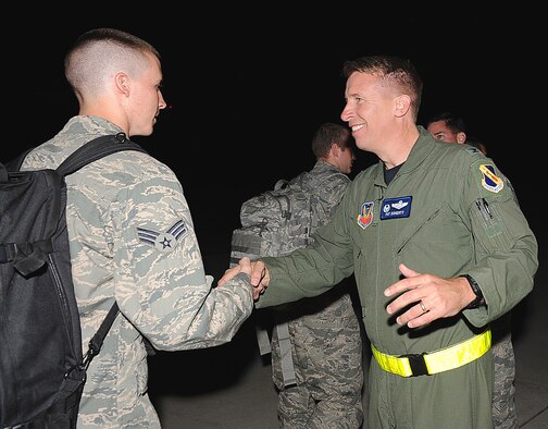 SEYMOUR JOHNSON AIR FORCE BASE, N.C. – 4th Fighter Wing Commander, Col. Patrick Doherty, welcomes Airmen home from a deployment March 15, 2011. Approximately 300 Airmen from the 336th Fighter Squadron, 4th Aircraft Maintenance Squadron, 4th Component Maintenance Squadron and the 4th Equipment Maintenance Squadron returned from a deployment to Afghanistan in support of Operation Enduring Freedom. (U.S. Air Force photo/ Senior Airman Gino Reyes)(RELEASED)