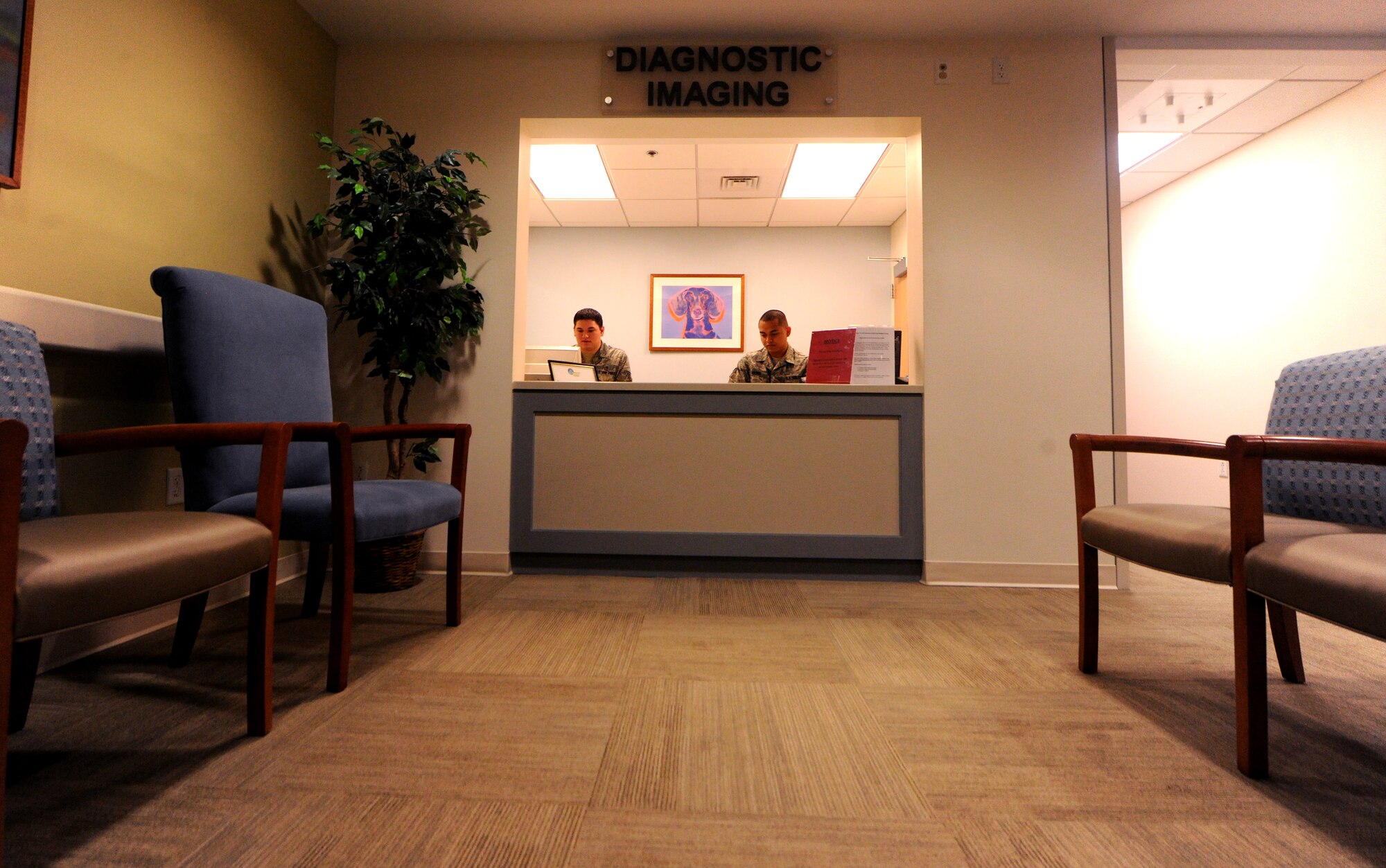 MOODY AIR FORCE BASE, Ga.-- Senior Airmen Chris Kingsbury and Jack Nierva, 23rd Medical Group diagnostic imaging, wait for patients March 16. Patients come to the diagnostic imaging section of the 23rd MDG after their primary care manager has ordered x-rays. (U. S. Air Force photo/Airman 1st Class Benjamin Wiseman)(RELEASED)