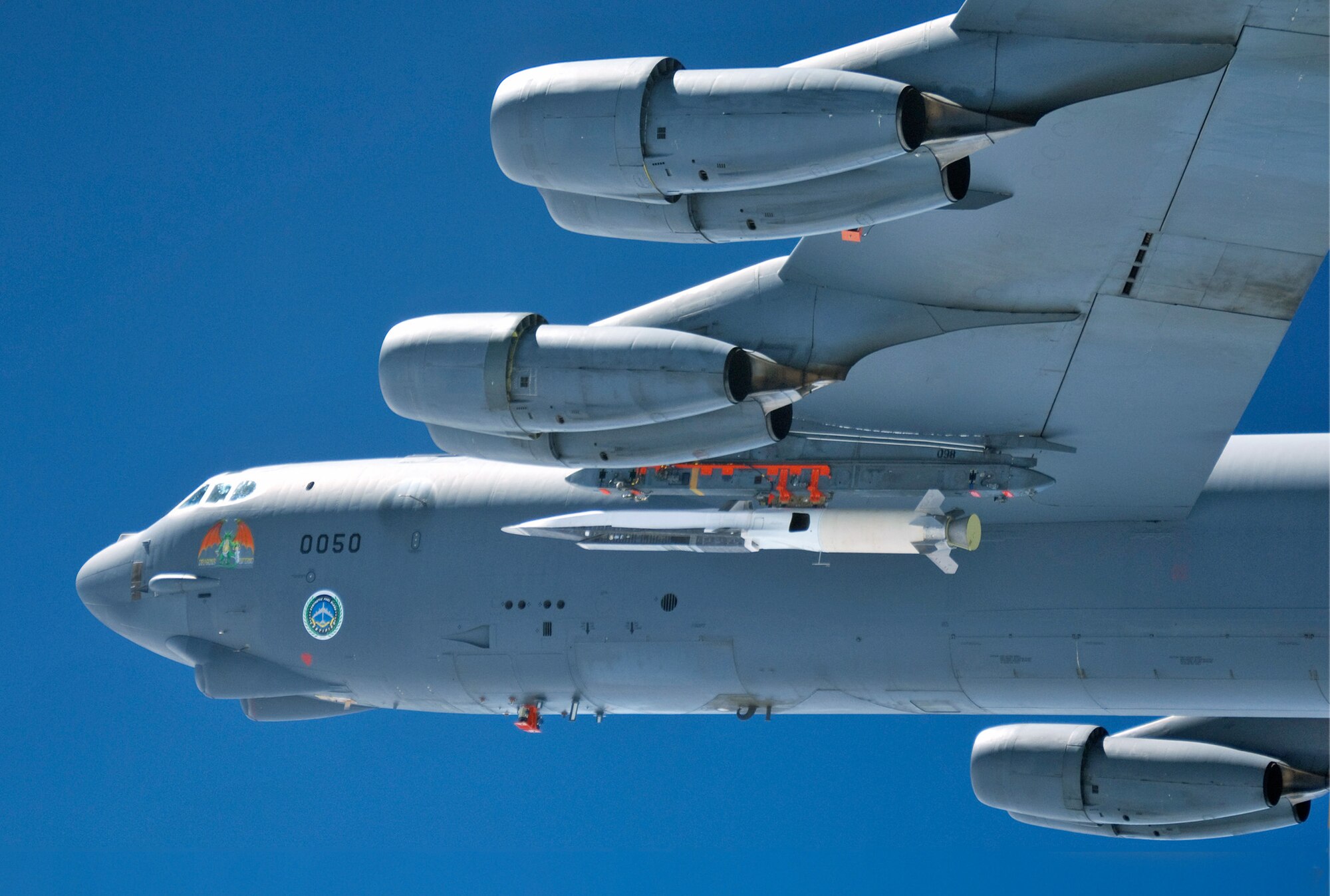 An Air Force Flight Test Center B-52 Stratofortress from Edwards Air Force Base, Calif., carries an X-51A Waverider prior to the scramjet’s first hypersonic flight test on March 26, 2010. Air Force engineers have made design modifications to the three remaining X-51A demonstrators and plan to resume the hypersonic flight test program in early spring of 2011. (U.S. Air Force photo)