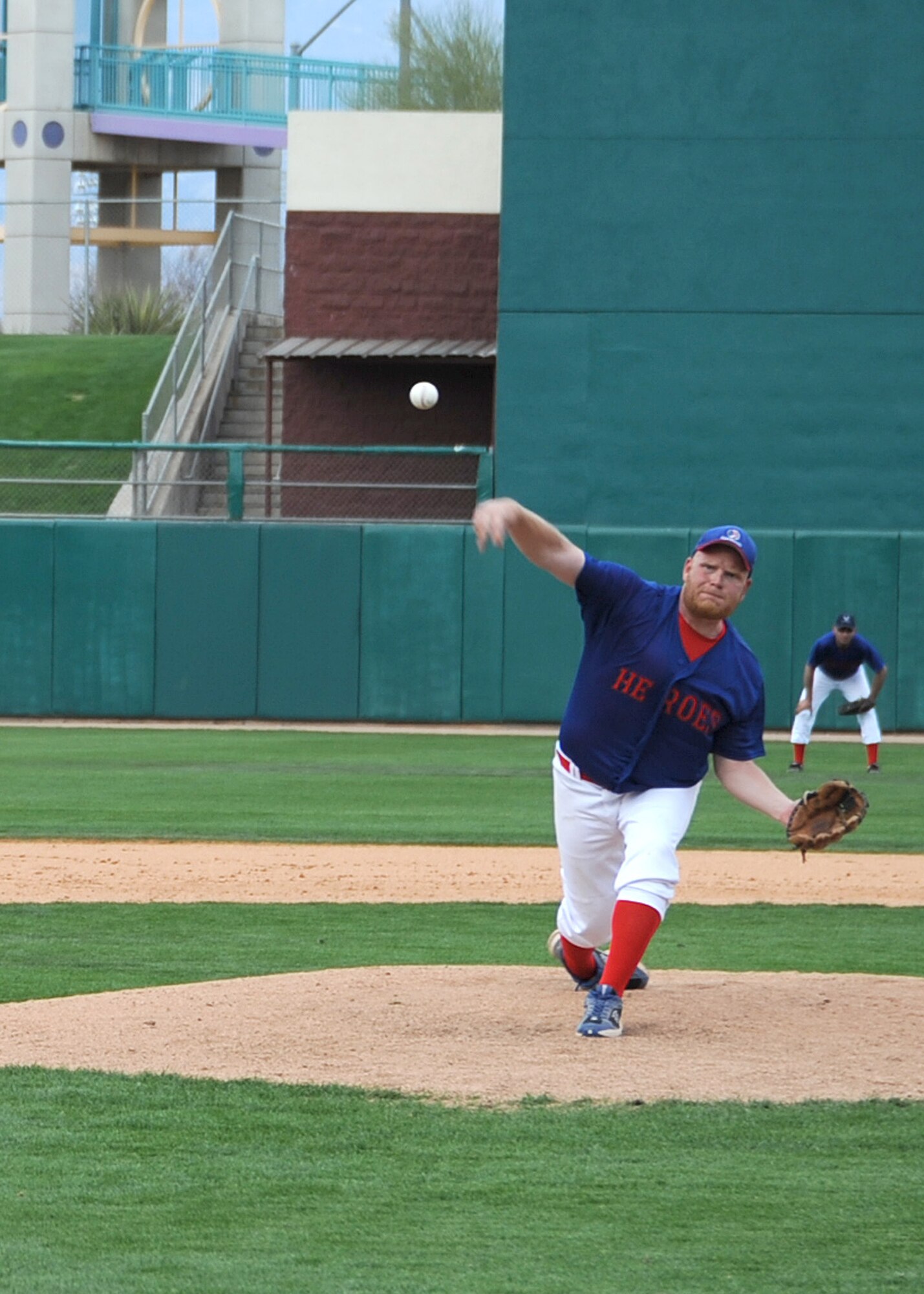 TUCSON, Ariz. - Relief pitcher James Sherry throws a pitch for the Heroes team during the Wounded Heroes Baseball Classic held at the AZ Veterans Memorial Stadium March 12. The Heroes defeated the Major League Baseball Legends, 11-2. (U.S. Air Force photo/Tech Sgt Christopher Campbell)