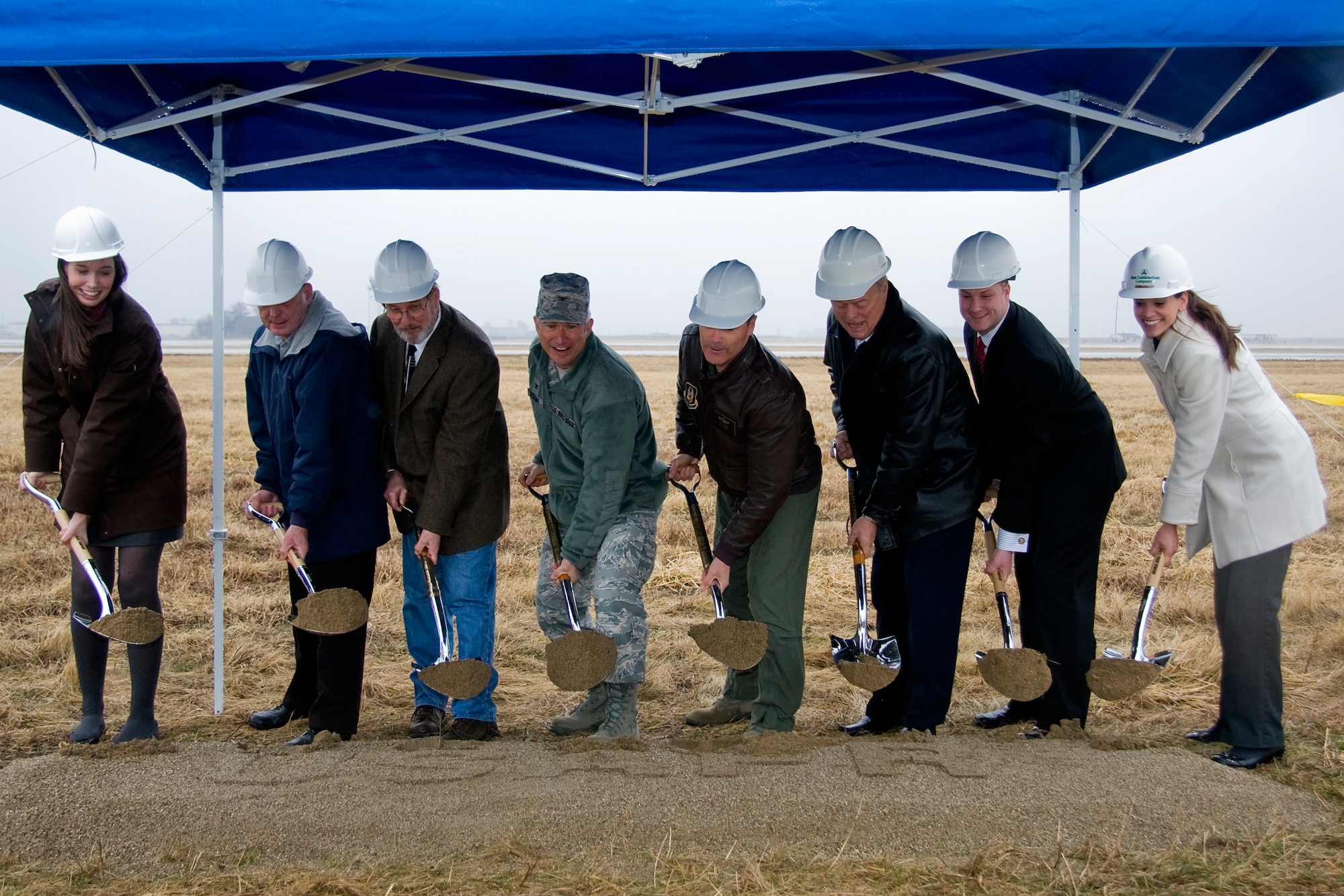 GRISSOM AIR RESERVE BASE, Ind. -- Honored guests dig up the first soil for the new air traffic control facility here during a special groundbreaking ceremony March 15. The new ATC tower, with a programmed cost of $7.4 million, will replace an existing structure built in 1965. From left are Meredith Perks, case manager for Congressman Joe Donnelly; John Gilpin, 434th Air Refueling Wing honorary wing commander; Terry Albaugh, 434th Operations Support Squadron air traffic manager; Col. Nicholas Desport, Air Force Reserve Command A7 deputy director of installations; Col. William T. "Tim" Cahoon, 434th ARW commander, Tom Weatherwax, Grissom Community Council vice president; Marques Pflum, staffer for Senator Dan Coats; and Jessica Mullins, contracting company project manager. (U.S. Air Force photo/Tech. Sgt. Mark R. W. Orders-Woempner)