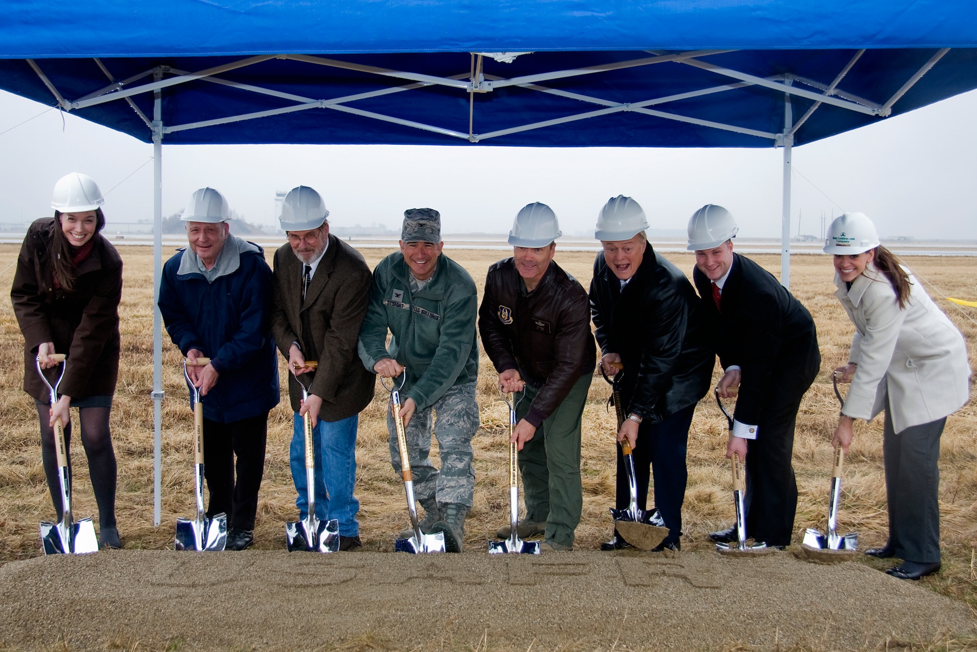 GRISSOM AIR RESERVE BASE, Ind. -- Honored guests pose for a photo during a special groundbreaking ceremony for a new air traffic control tower here March 15. When complete, the nine-story tower will provide Grissom's ATC with increased visibility, training simulator area, increased security, office space and enhanced environmental controls. From left are Meredith Perks, case manager for Congressman Joe Donnelly; John Gilpin, 434th Air Refueling Wing honorary wing commander; Terry Albaugh, 434th Operations Support Squadron air traffic manager; Col. Nicholas Desport, Air Force Reserve Command A7 deputy director of installations; Col. William T. "Tim" Cahoon, 434th ARW commander, Tom Weatherwax, Grissom Community Council vice president; Marques Pflum, staffer for Senator Dan Coats; and Jessica Mullins, contracting company project manager. (U.S. Air Force photo/Tech. Sgt. Mark R. W. Orders-Woempner)
