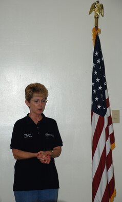 PATRICK AIR FORCE BASE, Fla. - Mrs. Ruth Dunn, wife of 920th Rescue Wing Commander, Col. Robert Dunn, speaks during a spouses meeting for the Heart Link program here. Experts from both military and civilain orginazations briefed an audience of about two dozen military spouses about their benefits and basic military need-to-know information.  (U.S. Air Force photo/Capt. Ryan Liss)