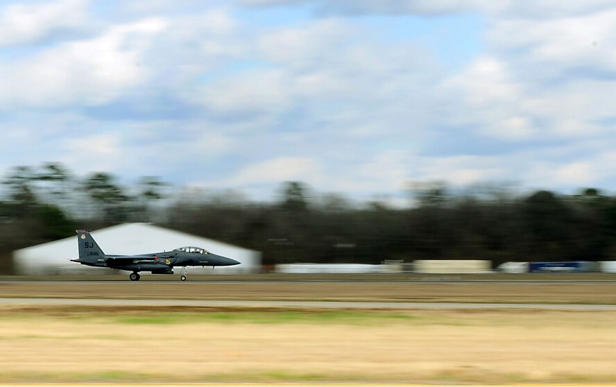Joint Base Charleston, S.C-- An F-15E Strike Eagle from the 333rd Fighter Squadron, Seymour Johnson A.F.B., N.C., takes off here, Feb. 25, 2011. (U.S. Air Force photo by Airman 1st Class James Richardson) (RELEASED) 