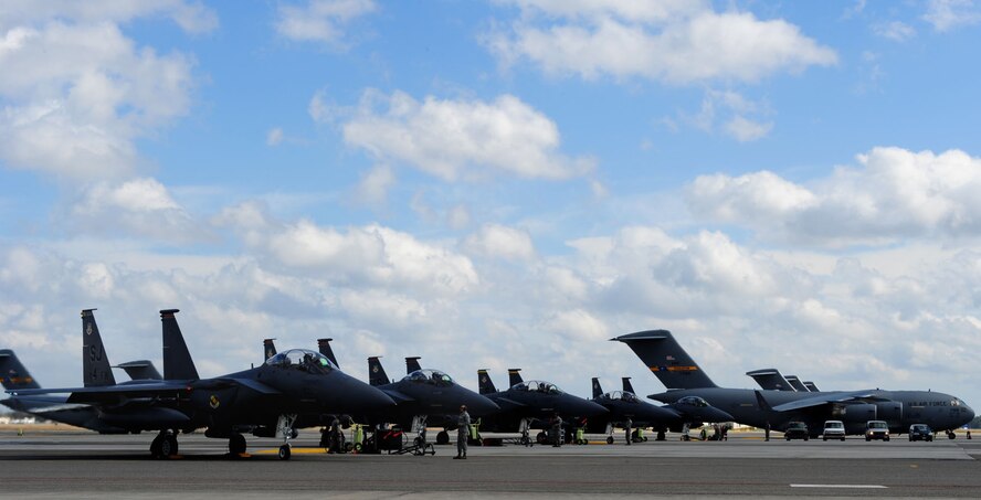 Joint Base Charleston, S.C.-- F-15E Strike Eagles from the 333rd Fighter Squadron, Seymour Johnson AFB, N.C., park on the ramp here, Feb. 25, 2011. The Strike Eagles are in Charleston to perform training exercises. (U.S. Air Force photo/Airman 1st Class James Richardson) (RELEASED) 

