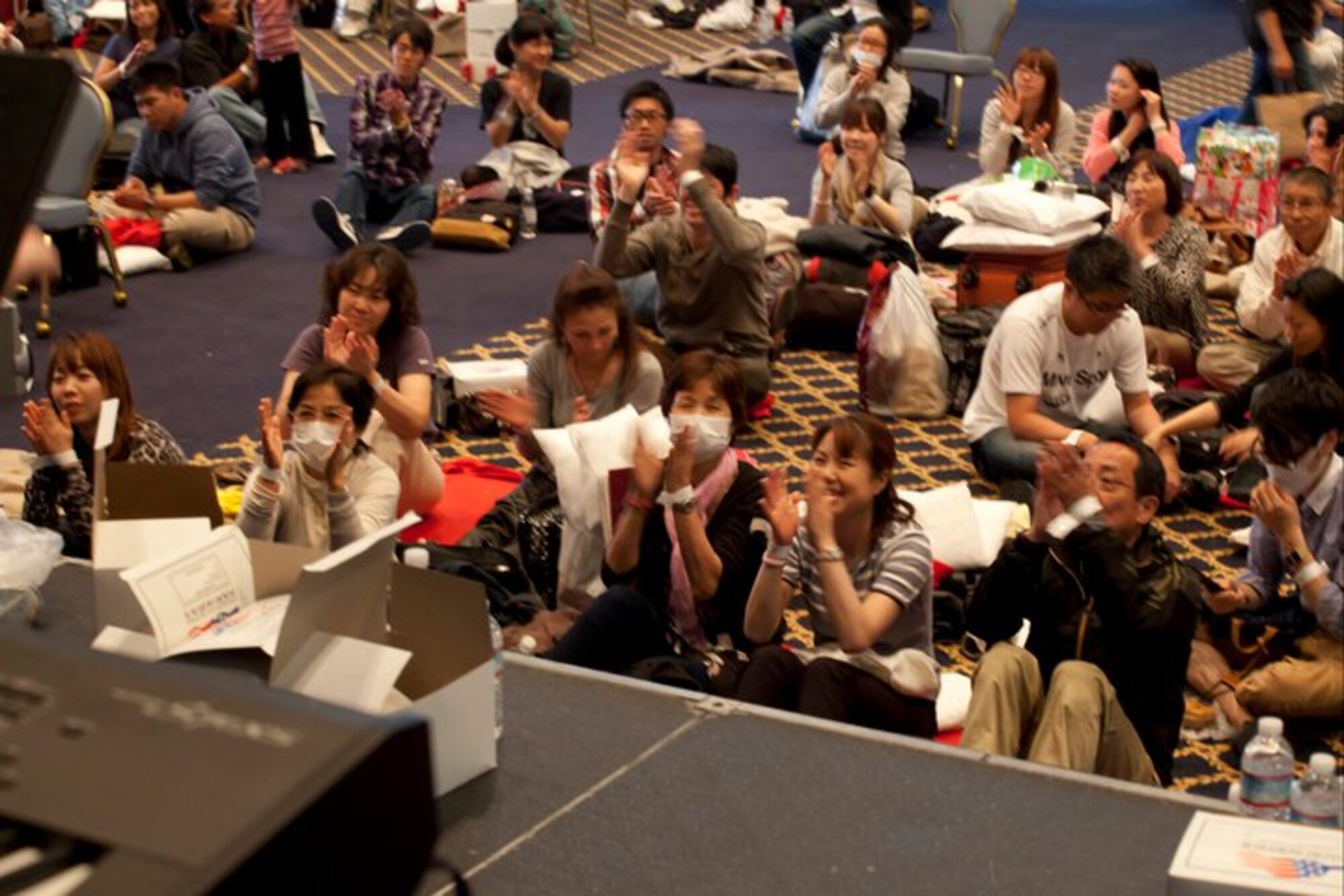 Band interacts with the audience as they enjoy the uplifting and
relaxing sounds of jazz music while audience claps along.  (Courtesy photo)
