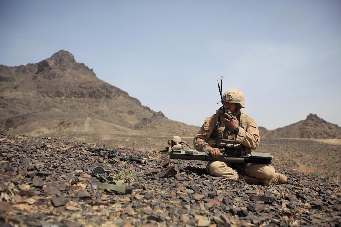 Sgt. Jesse Walden, chief scout with C Company, 3rd Light Armored Reconnaissance Battalion, prepares to fire a light anti-armor rocket at an insurgent fighting position in the Bahram Chah Valley during Operation Rawhide II in Helmand province, Afghanistan, March 16. During the four-day raid on the key insurgent trafficking hub on the Pakistan border, insurgents fought mainly from hillside fighting positions. The fighters Walden engaged were using a cave a few hundred yards from a Marine position.