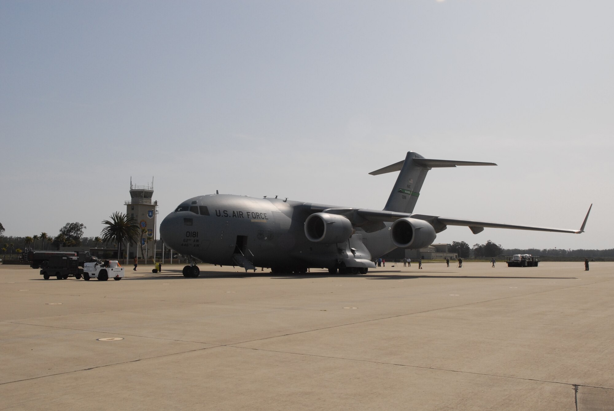 VANDENBERG AIR FORCE BASE, Calif. - A C-17 cargo aircraft from McCord Air Force Base, Wash., waits to receive its load of 34,000 pounds of boric acid from the Diablo Canyon Power Plant for transport to Japan on Thursday, March 17, 2011. The boric acid is being sent to aid in the cooling of Japan's Fukushima Daiichi Nuclear Complex. Boric acid is used in nuclear power plants to control the fission rate of uranium. (U.S. Air Force photo/ Jerry E. Clemens, Jr.)