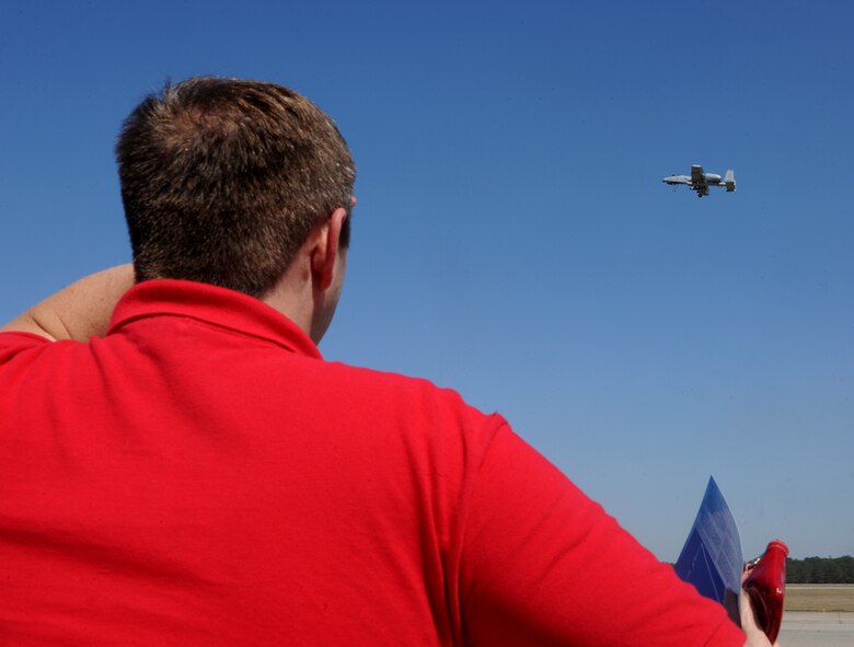 MOODY AIR FORCE BASE, Ga.-- A participant of Leadership Lowndes observes as the A-10 East Demonstration Team aircraft flies overhead during a base tour March 17. Community leaders from Lowndes County visit Moody annually and the participants get to see Moody’s mission capabilities. (U.S. Air Force photo/Airman 1st Class Benjamin Wiseman)(RELEASED)