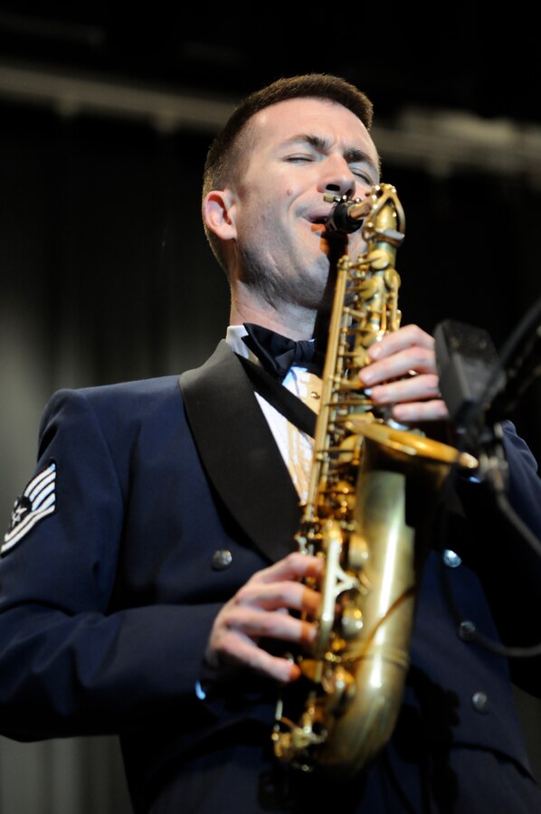Tech. Sgt. Tyler K. Kuebler, lead alto saxophonist with the U.S. Air Force Band Airmen of Note, solos March 15 at Robert E. Lee High School, Staunton, Va. This performance was the first on the Note’s 2011 spring tour. (U.S. Air Force photo by Airman 1st Class Tabitha N. Haynes)