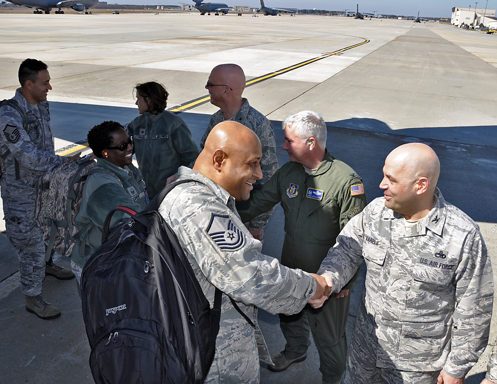 JOINT BASE MCGUIRE-DIX-LAKEHURST, N.J.-- Leaders from the 514th Air Mobility Wing and 87th Air Base Wing greet an inspection team from the Air Force Reserve Command on the flightline here March 17, 2011. The inspectors are here to perform a unit compliance inspection of the 514th AMW. (U.S. Air Force photo/Tech. Sgt. Shawn J. Jones) 