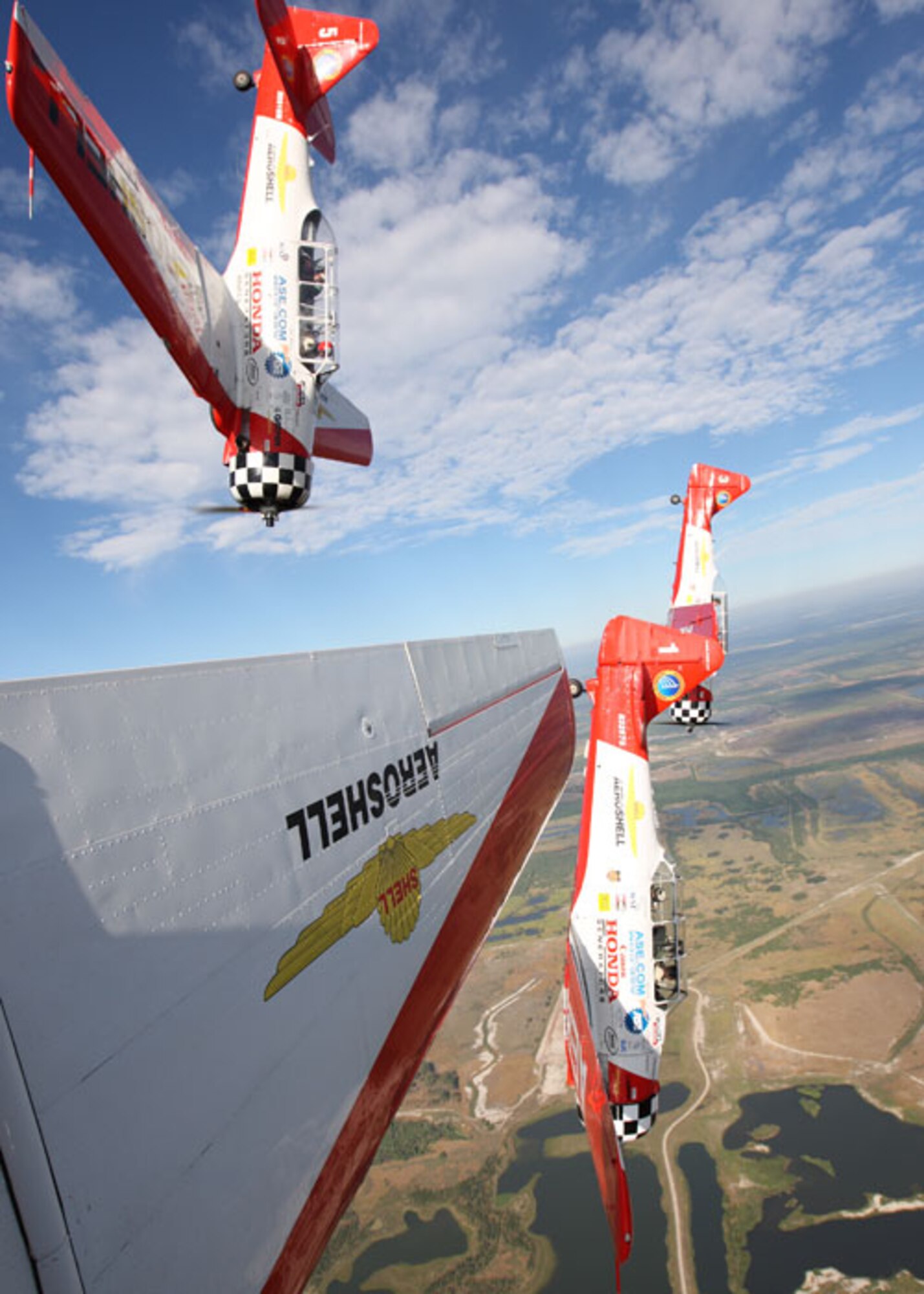 The Aero Shell Aerobatic Team perform aerial stunts in the AT-6 Texan at a recent air show. (courtesy photo)