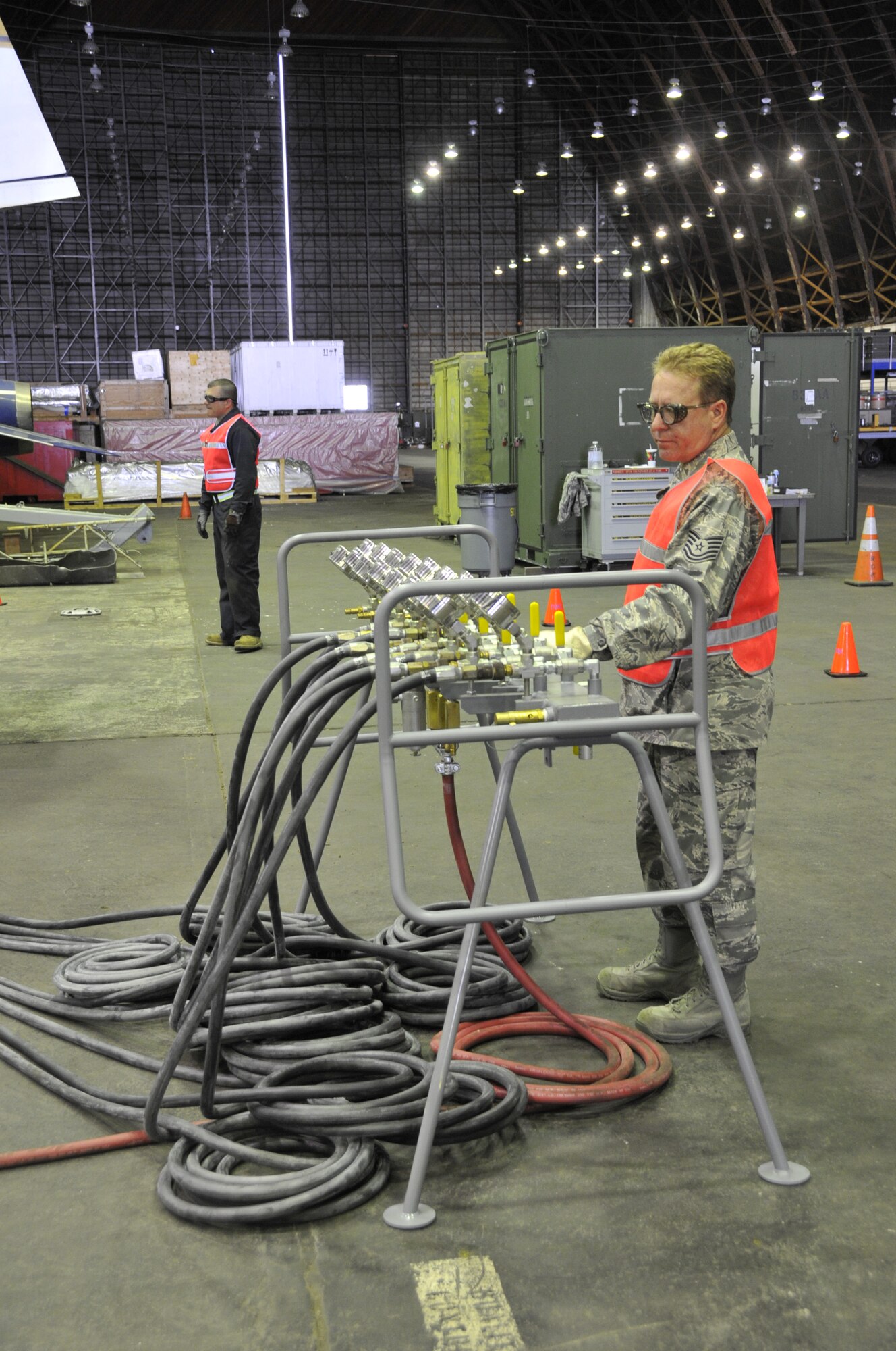 Tech. Sgt. Kurtis Newby, an aircraft maintenance technician assigned to the 129th Maintenance Squadron, operates the control that stabilizes the airbag manifold under the tail of a TF-104G aircraft.  Airmen from the 129th Rescue Wing conducted a full-scale airbag lift exercise using a TF-104G static display to simulate a downed aircraft at Moffett Federal Airfield, Calif., Mar. 15, 2011.  (Air National Guard photo by Tech. Sgt. Ray Aquino/RELEASED)

More information about the TF-104G is available at http://www.nationalmuseum.af.mil/factsheets/factsheet.asp?id=2313.