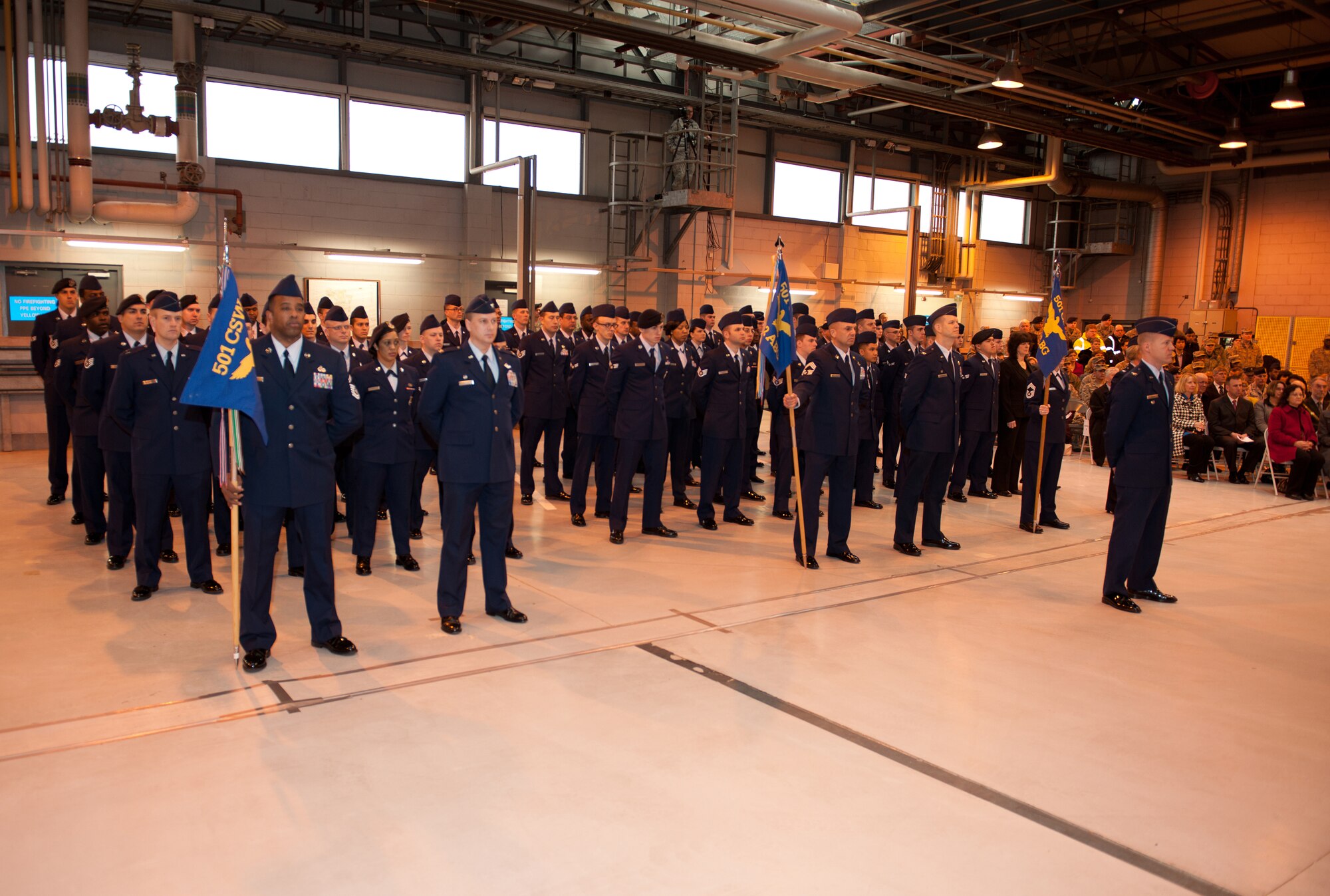 RAF ALCONBURY, United Kingdom - Airmen of the 501st Combat Support Wing stand in formation during a change of command ceremony March 17 at RAF Alconbury. The formation, led by Col. Jeff Yocum, 501st CSW vice commander, was comprised of Airmen from the wing’s three air base groups. (U.S. Air Force photo by Tech. Sgt. John Barton)