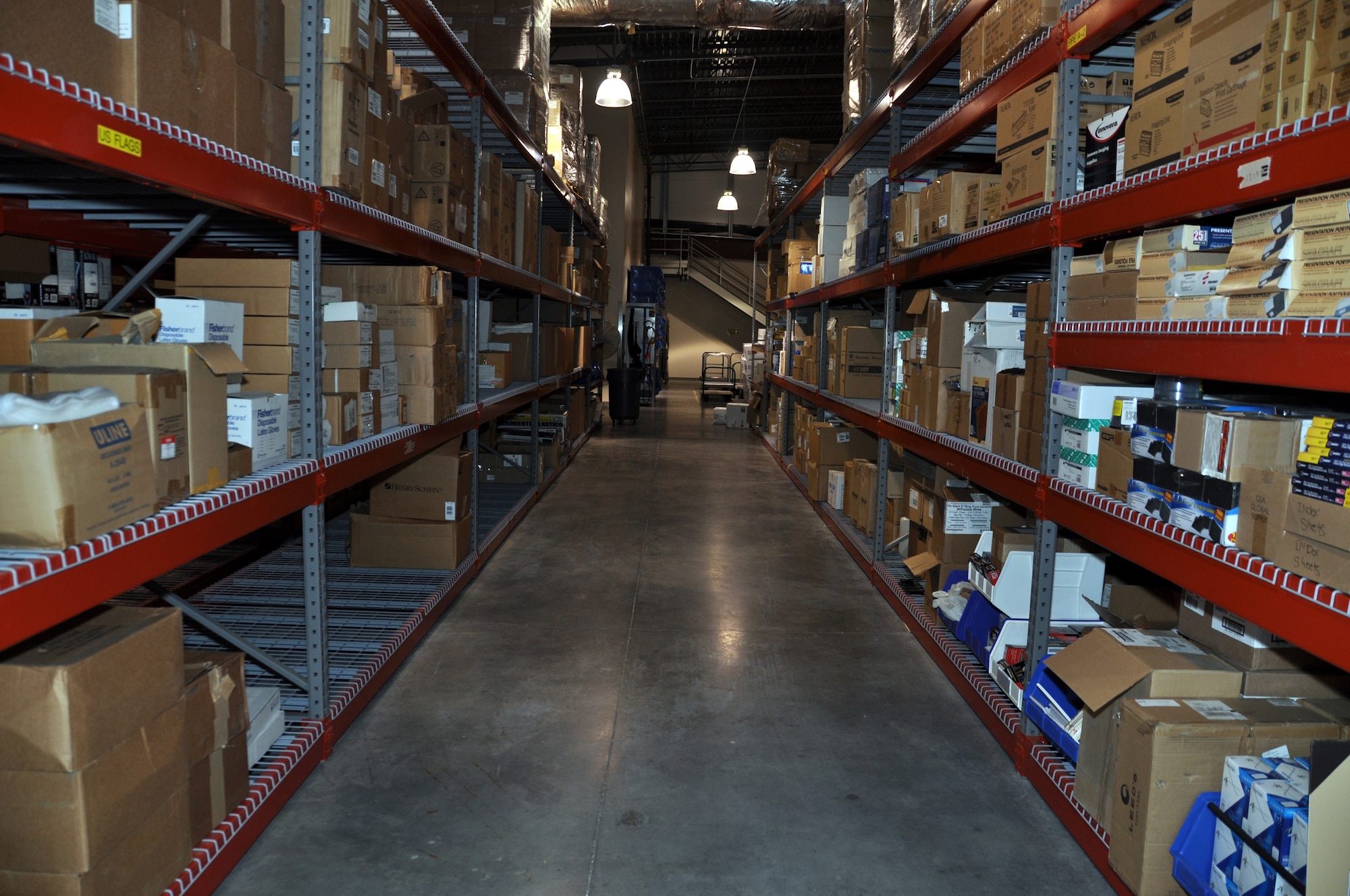 This after image of an aisle in the warehouse at the Charles C. Carson Center for Mortuary Affairs shows the results of a Six Sigma project here March 7-11, 2011. (U.S. Air Force photo/Christin Michaud)