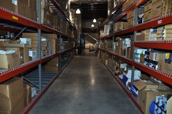This after image of an aisle in the warehouse at the Charles C. Carson Center for Mortuary Affairs shows the results of a Six Sigma project here March 7-11, 2011. (U.S. Air Force photo/Christin Michaud)