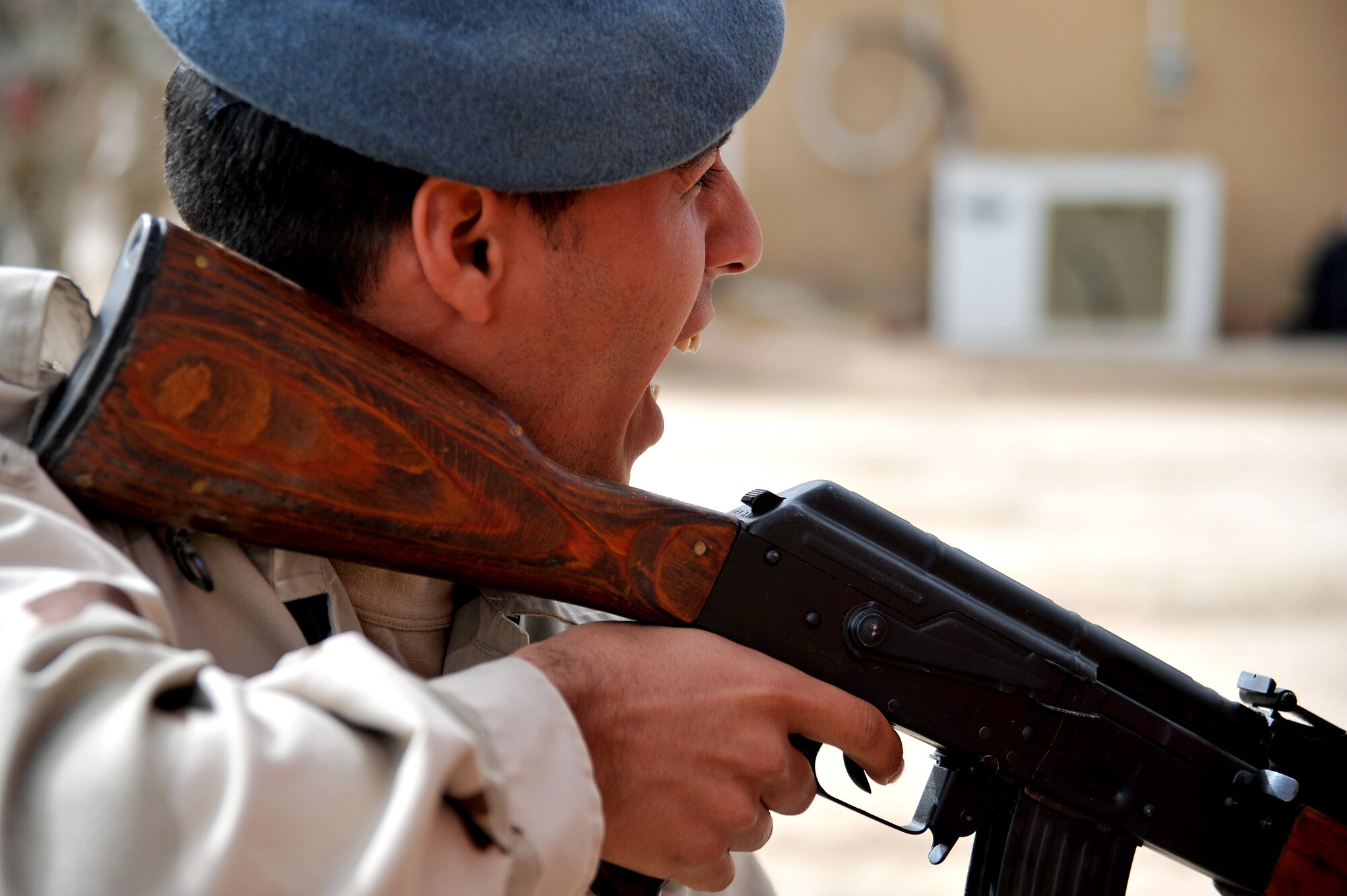 An Iraqi airman challenges a suspicious individual during a security forces training session held by members of the 407th Expeditionary Security Forces Flight Feb. 21, 2011, at Ali Air Base, Iraq. (U.S. Air Force photo by Senior Airman Andrew Lee/Released)