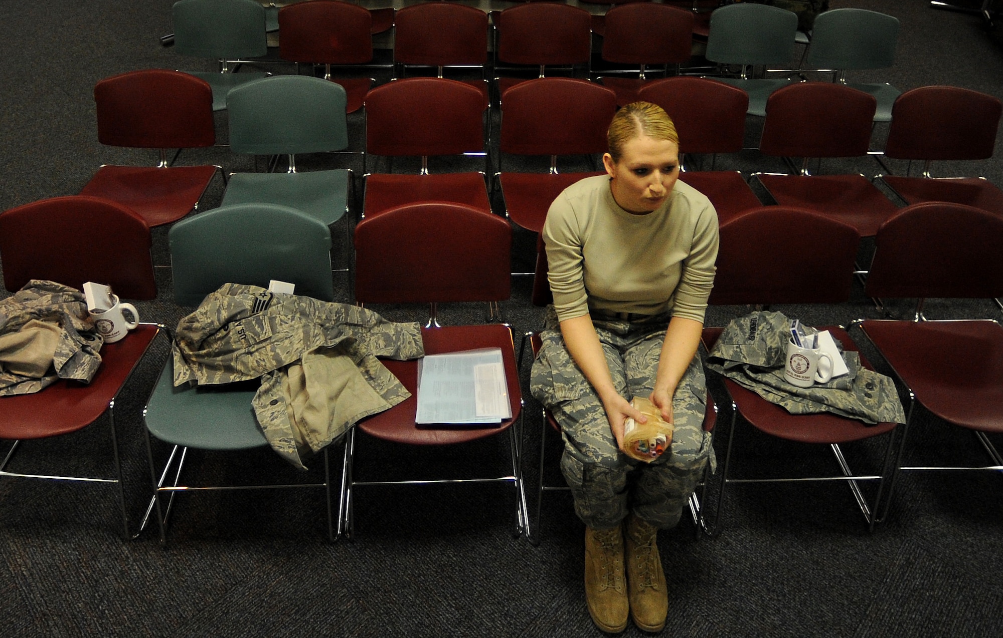 WHITEMAN AIR FORCE BASE, Mo. -- Senior Airman Kelsey Lehenbauer, 509th Security Forces Squadron, waits to donate blood during an Armed Services Blood Program blood drive March 16, 2011.The blood collected will be used to care for deployed forces. (U.S. Air Force photo by Senior Airman Kenny Holston)(Released)

