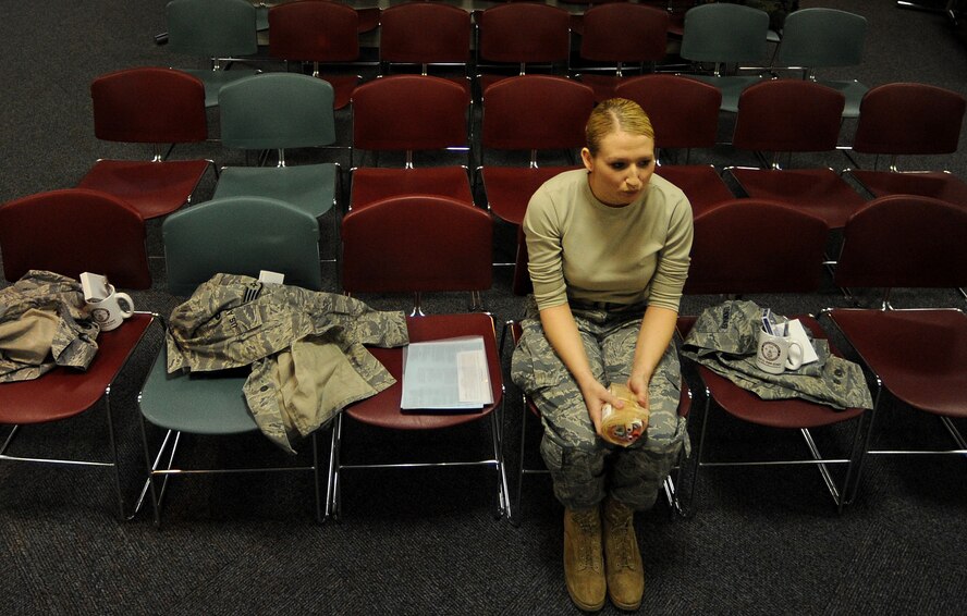 WHITEMAN AIR FORCE BASE, Mo. -- Senior Airman Kelsey Lehenbauer, 509th Security Forces Squadron, waits to donate blood during an Armed Services Blood Program blood drive March 16, 2011.The blood collected will be used to care for deployed forces. (U.S. Air Force photo by Senior Airman Kenny Holston)(Released)

