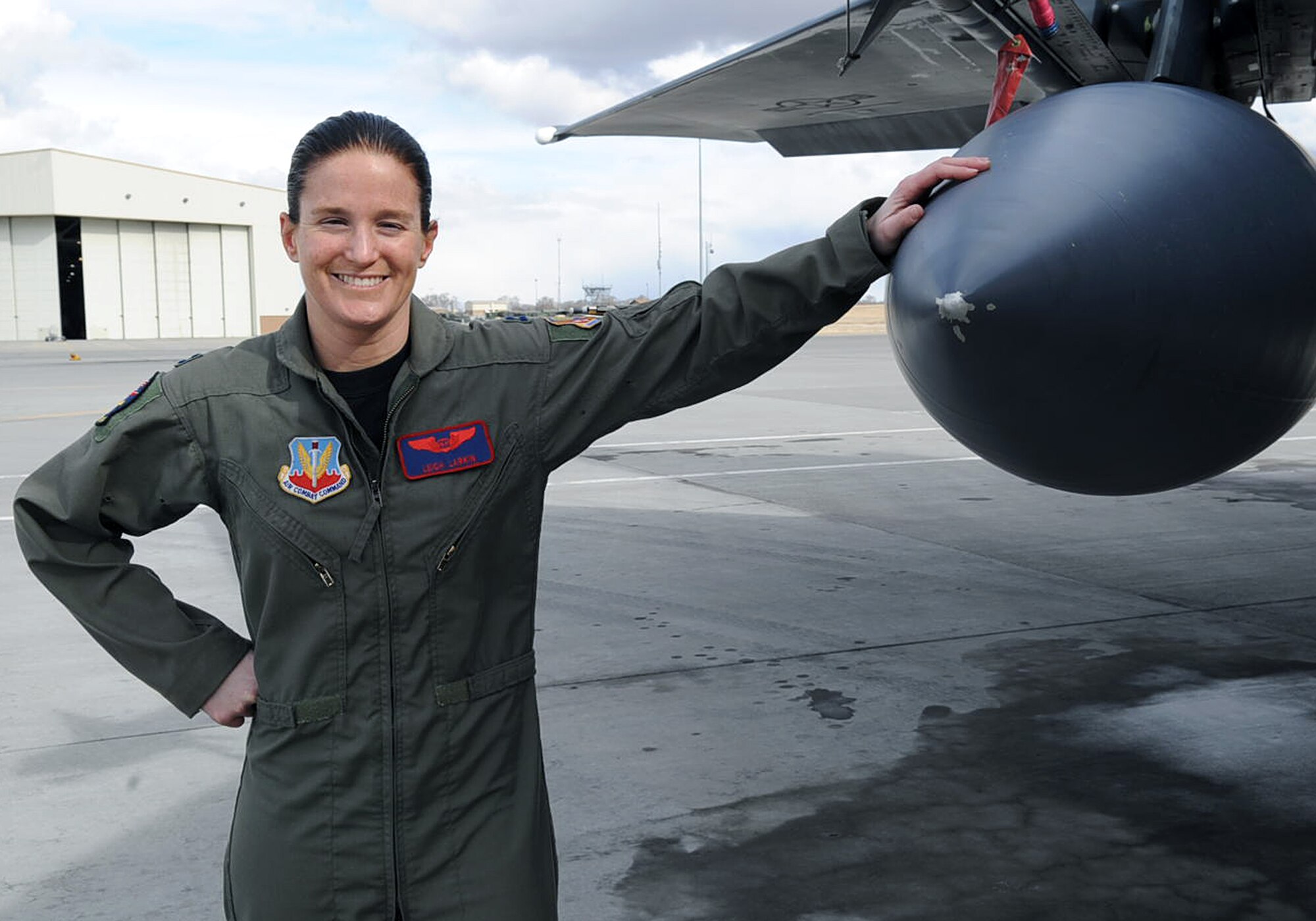 MOUNTAIN HOME AIR FORCE BASE, Idaho -- Capt. Leigh Larkin, 389th Fighter Squadron weapons system officer, leans on an F-15E Strike Eagle Feb. 17. Captain Larkin was nominated for the Mackay Trophy for a meritorious flight during a deployment in Afghanistan this past April. (U.S. Air Force photo by Staff Sgt. Roy Lynch)
