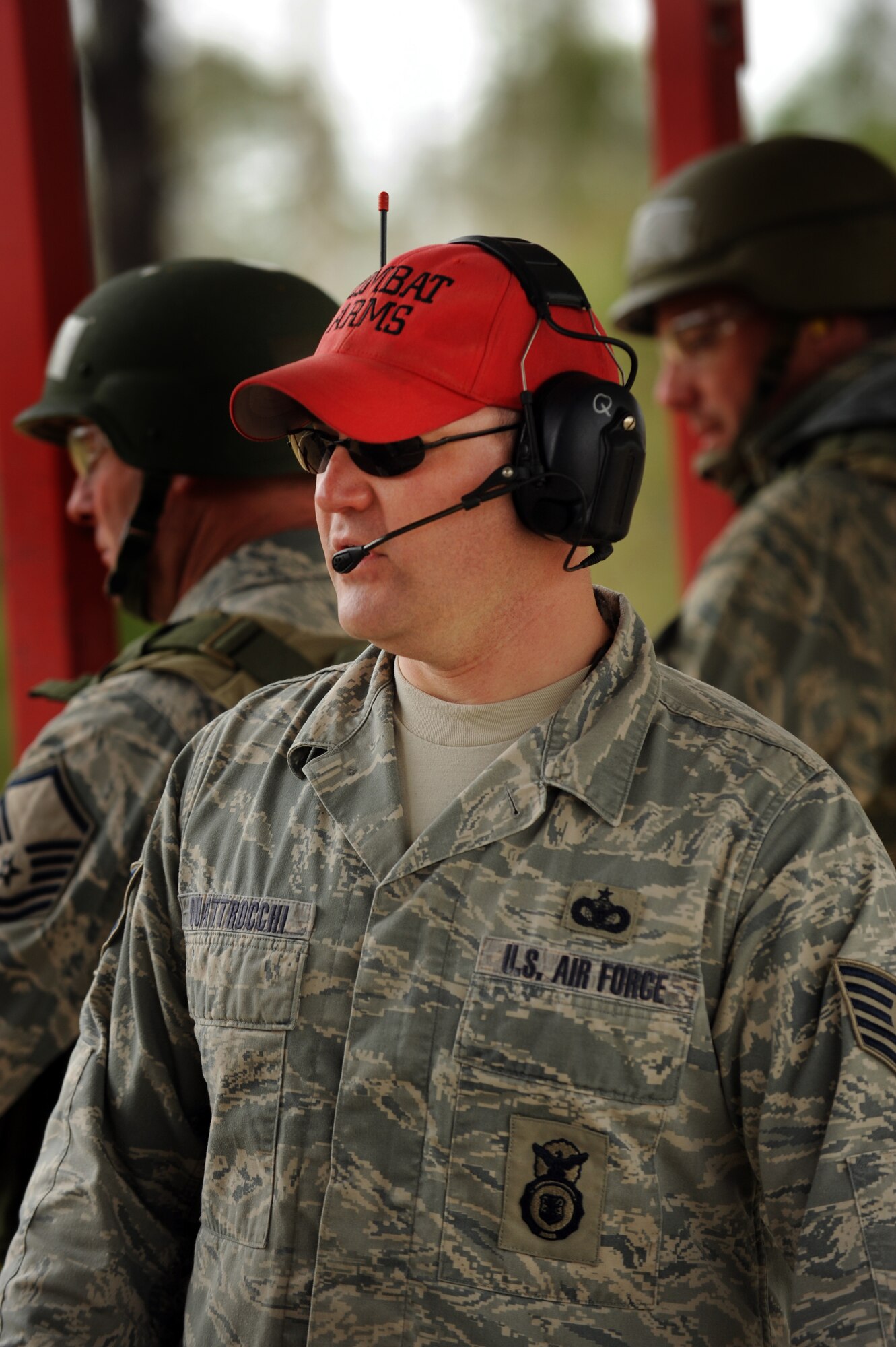 MOODY AIR FORCE BASE, Ga. -- Tech. Sgt. Russell Quattrocchi, 23rd Security Forces Squadron combat arms instructor, observes Moody members as they shoot in multiple positions at the Combat Arms Training and Maintenance range Feb. 11. Sergeant Quattrocchi helped ensure the different shooting positions were correctly performed. (U.S. Air Force photo/Airman 1st Class Douglas Ellis)(RELEASED)
