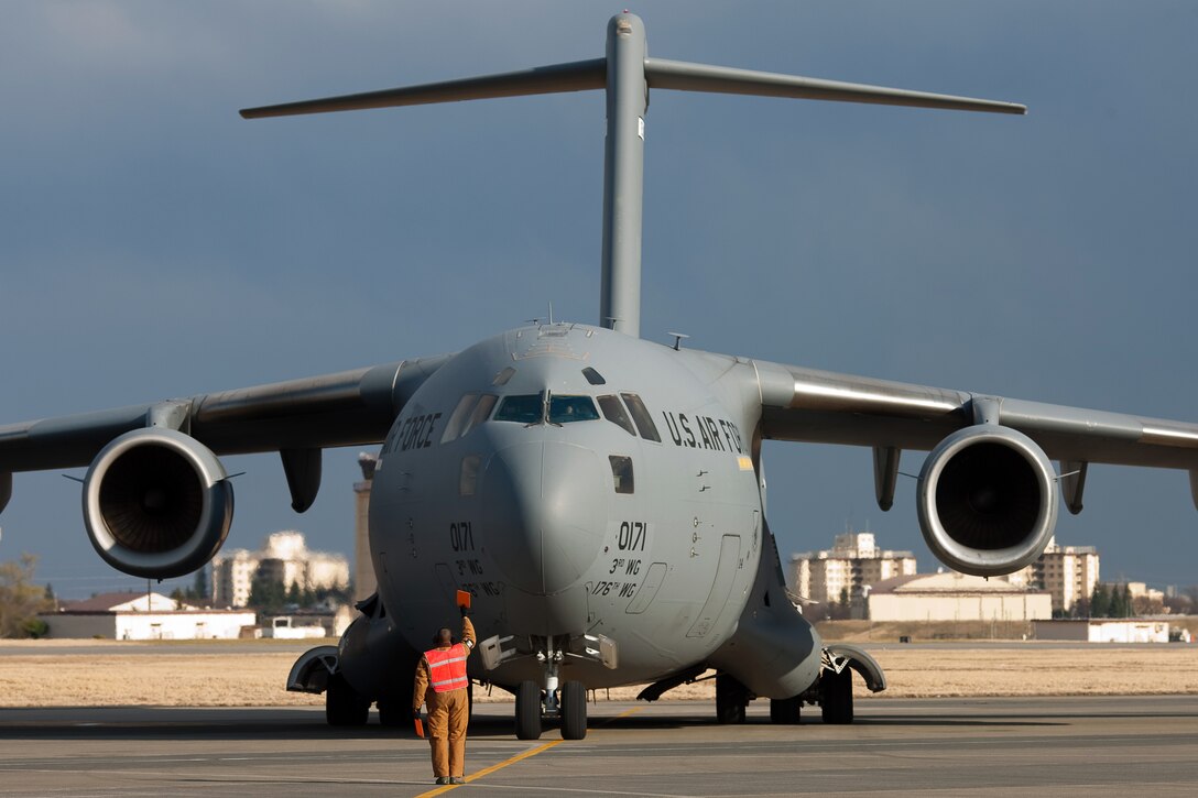 C-17 transports JGSDF convoy and troops from Okinawa