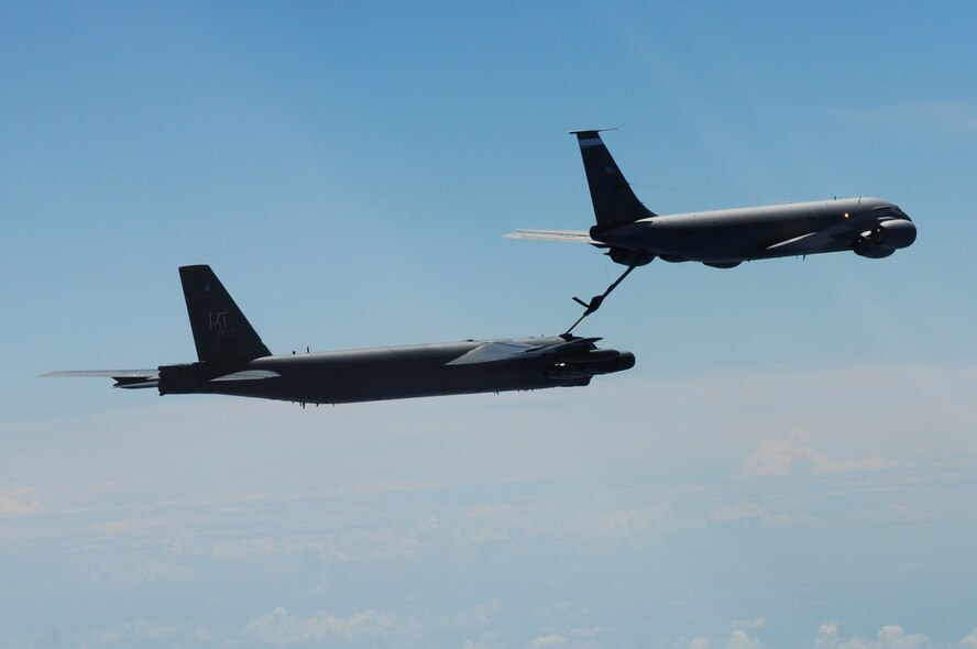 ANDERSEN AIR FORCE BASE, Guam- A B-52 Stratofortress from the 69th Expeditionary Bomb Squadron, Minot Air Force Base, N.D., connects for in-flight refueling with a KC-135 tanker during a training mission, March 15.(U.S. Air Force photo/ Senior Airman Carlin Leslie)