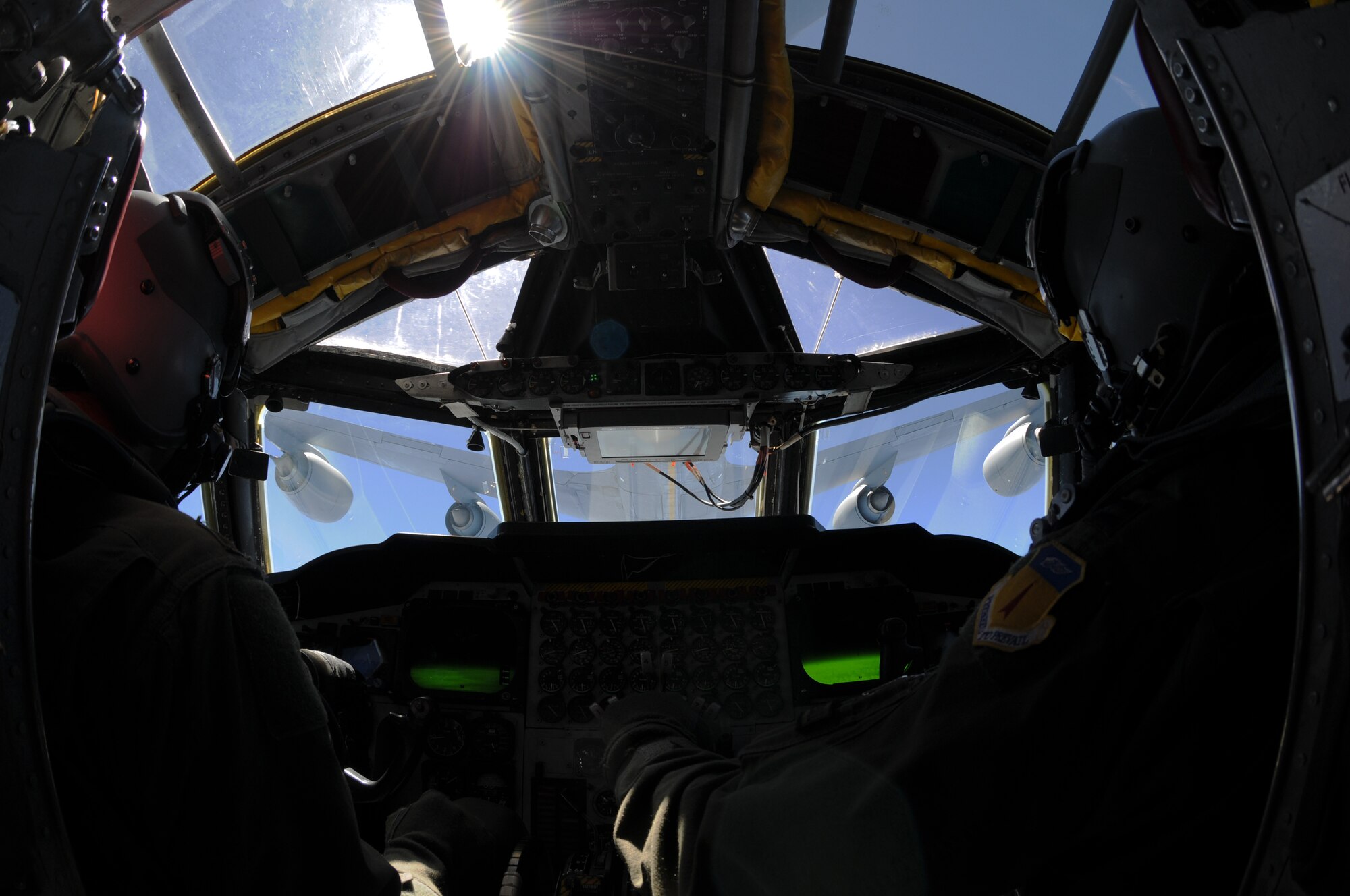 ANDERSEN AIR FORCE BASE, Guam- B-52 Stratofortress pilots from the 69th Expeditionary Bomb Squadron, Minot Air Force Base, N.D., fly into position during an in-flight refueling mission, March 15. The pilots use a series of lights and guide lines on the bottom of the KC-135 tanker to correctly align the aircraft for refueling.(U.S. Air Force photo/ Senior Airman Carlin Leslie)
