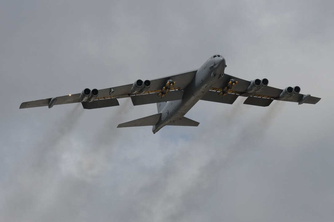 ANDERSEN AIR FORCE BASE, Guam - A B-52 Stratofortress, "The Buff" of the 69th Expeditionary Bomb Squadron from Minot Air Force Base, N.D., lifts off with M117 air-dropped general purpose bombs, March 14 here. The bombs will be released over a training range north of Andersen. (U.S. Air Force photo/ Senior Airman Carlin Leslie)
