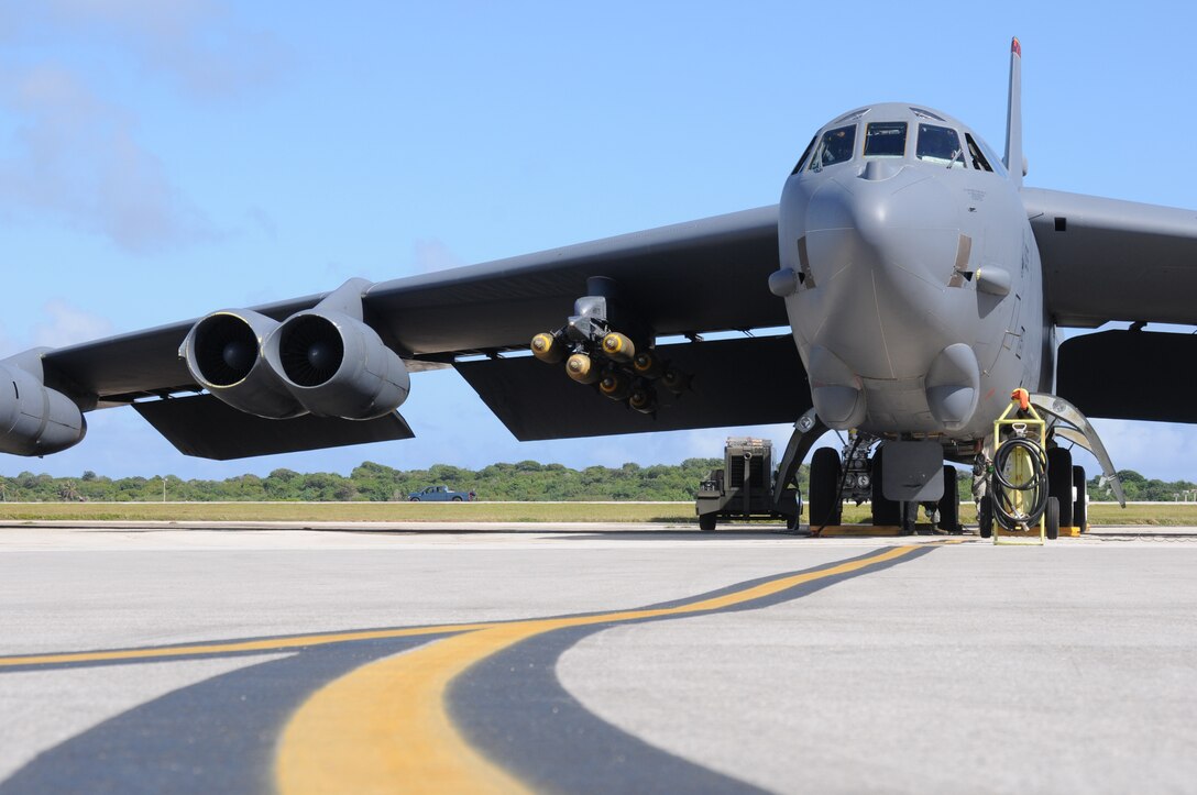 ANDERSEN AIR FORCE BASE, Guam- A B-52 Stratofrotress from the 69th Expeditionary Bomb Squadron, Minot Air Force Base, N.D., prepares for engine start-up March 14. The crew chiefs and pilots complete their checklists before engines are cleared for start-up.(U.S. Air Force photo/ Senior Airman Carlin Leslie)