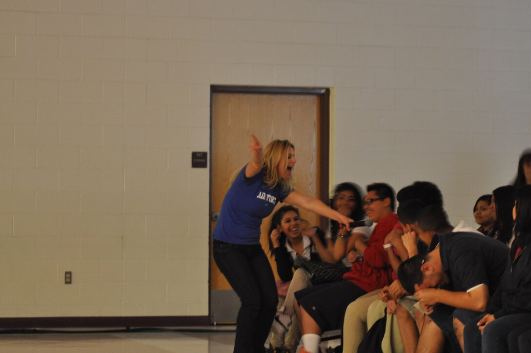 SrA Courtney Clifford sings to students at Kings Ridge Preparatory Academy in Phoenix, AZ on March 14, 2011.