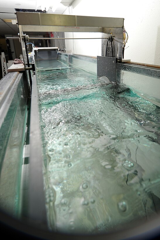 A wave energy converter is tested in a water tank at the Air Force Academy Jan. 27, 2011, by members of the Academy's Department of Aeronautics who were applying their expertise in fluid dynamics to successfully harness wave energy.  (U.S. Air Force photo/Rachel Boettcher)