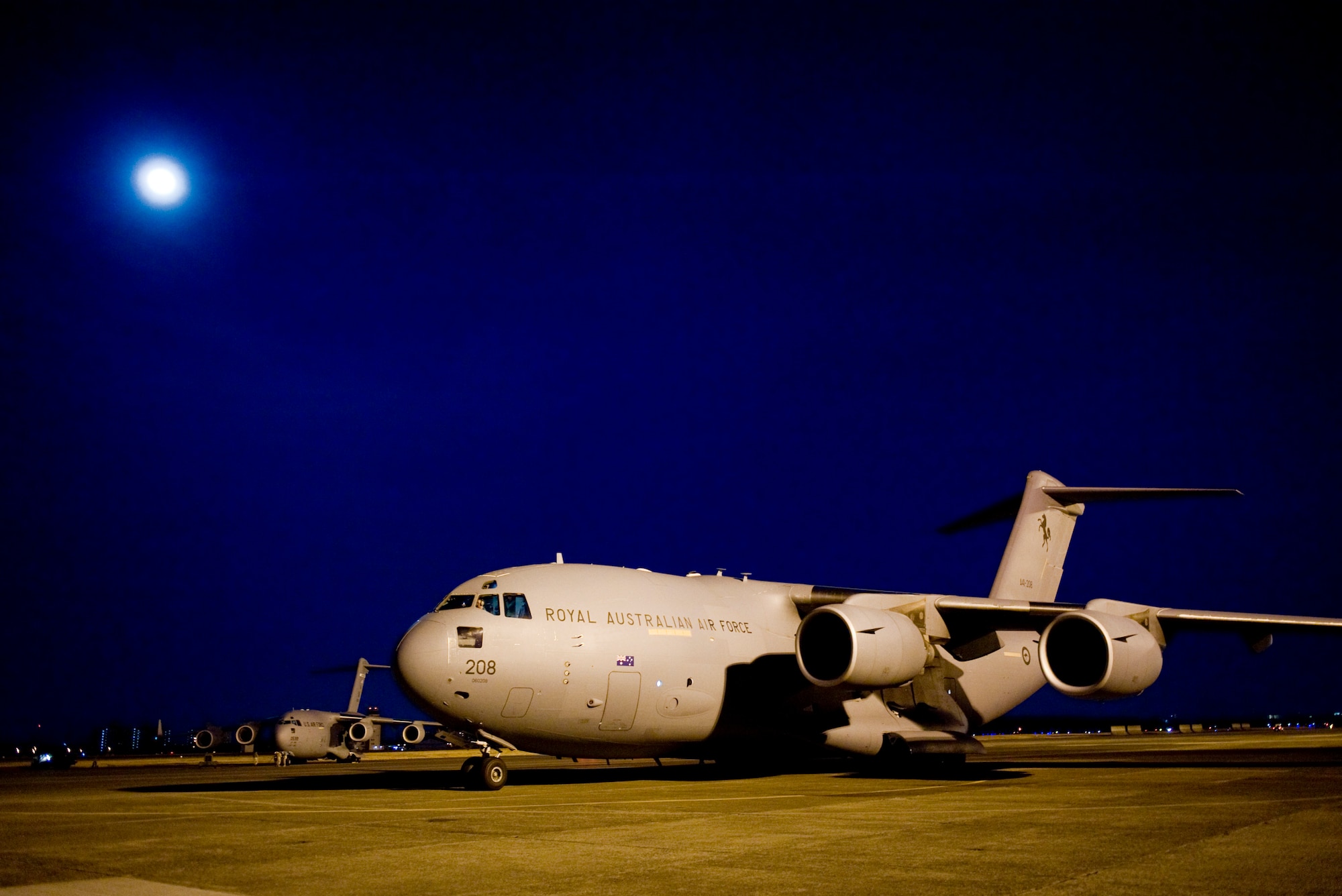 YOKOTA AIR BASE, Japan -- A C-17 Globemaster III, from the Royal Australian Air Force's 36th Airlift Squadron, sits on Yokota's flight line here Japan March 18 after flying from Okinawa. The RAAF transported the 15th Brigade of the Japan Ground Self Defense Force from Okinawa to help with Japan's earthquake and tsunami relief effort. (U.S. Air Force photo/Staff Sgt. Jonathan Steffen)