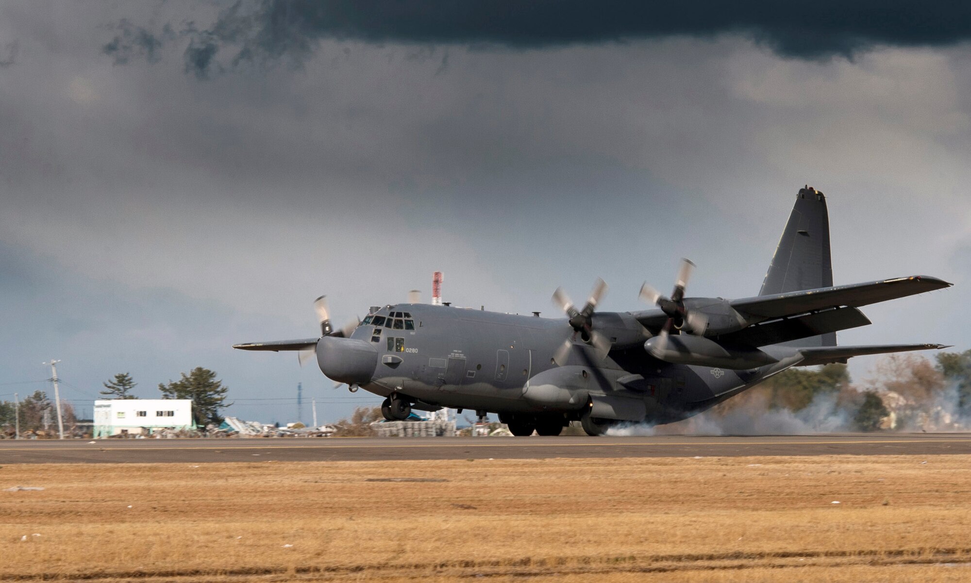 An MC-130H Combat Talon II pilot lands March 16, 2011, at Sendai Airport, Japan. (U.S. Air Force photo/Staff Sgt. Samuel Morse)