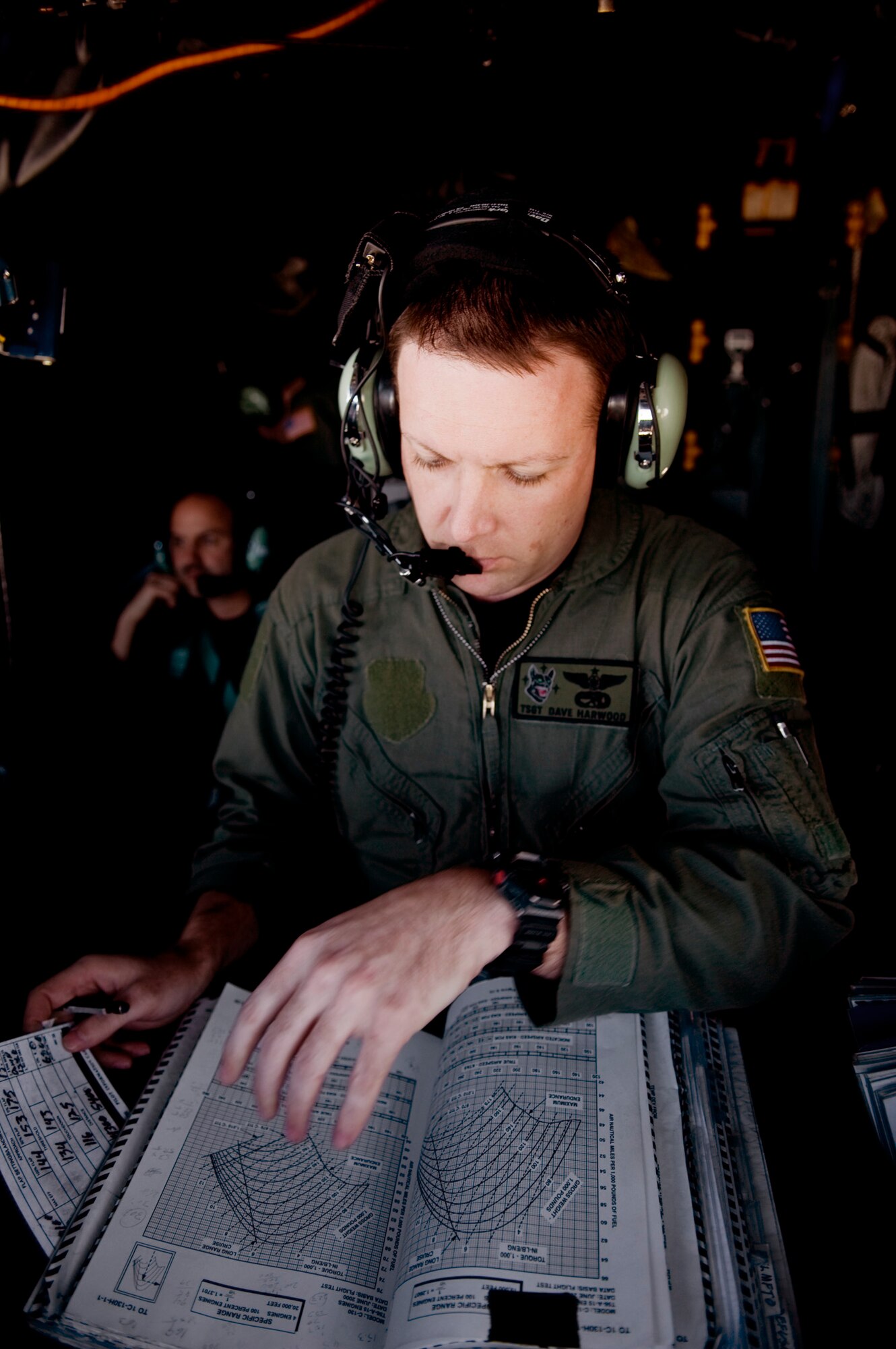 Tech. Sgt. Dave Harwood calculates take-off and landing distance March 17, 2011, at Yamagata Airport, Japan, to establish a forward area refueling point there. FARPs allow aircraft to operate at further distances by allowing the aircraft to refuel where no fuel typically exists. The fuel at Yamagata Airport will be used for American search-and-recovery teams during Japan's earthquake and tsunami relief. Sergeant Harwood is a flight engineer with the 17th Special Operations Squadron at Kadena Air Base, Japan. (U.S. Air Force photo/ Staff Sgt. Jonathan Steffen) 