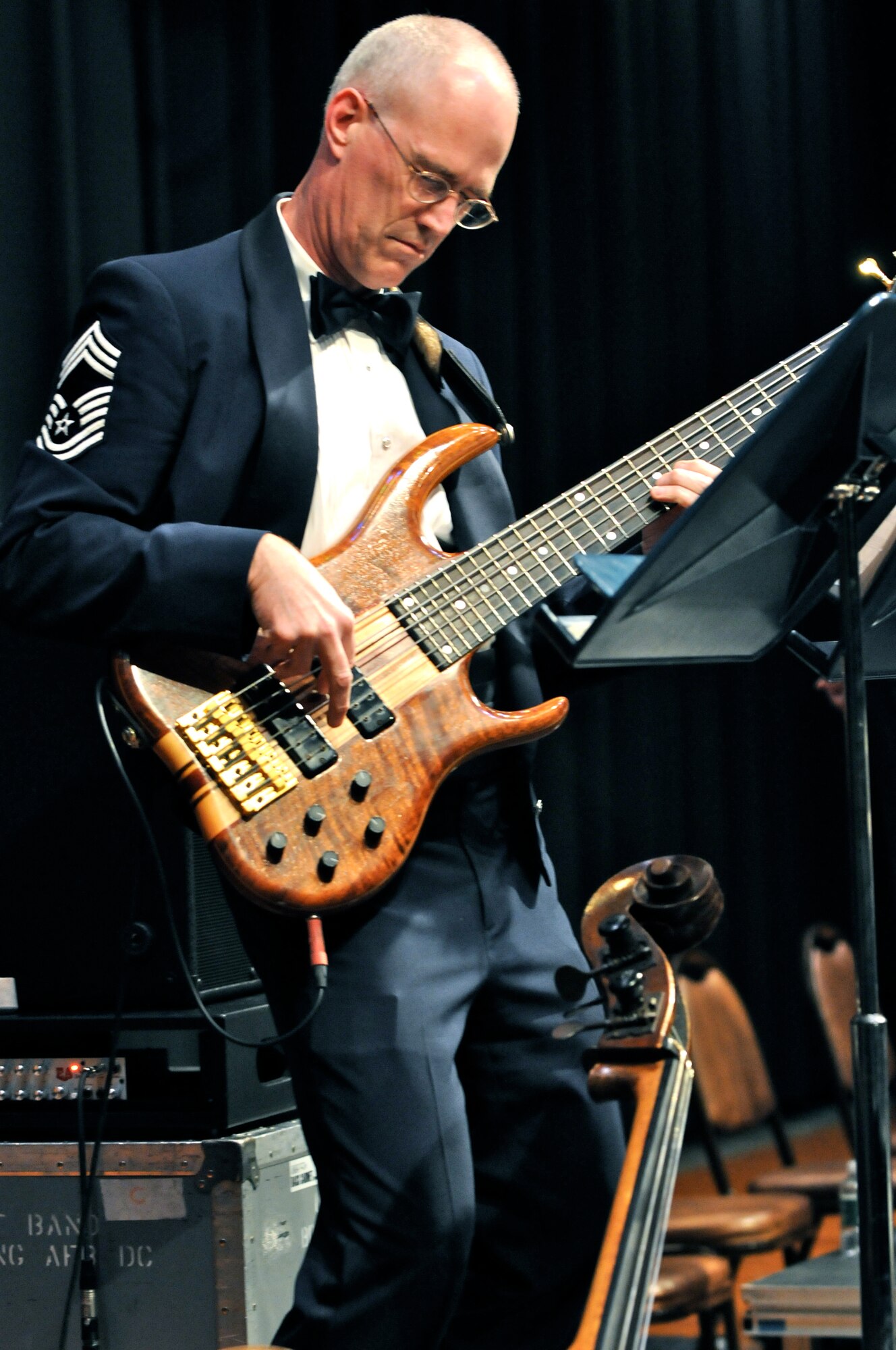 Chief Master Sgt. Paul Henry, bassist with the U.S. Air Force Band Airmen of Note, solos March 16 at Bassett High School, Bassett, Va. The Note is traveling through Virginia, Tennessee, Mississippi and Arkansas on it's 2011 Spring Tour. (U.S. Air Force photo by Airman 1st Class Tabitha N. Haynes)