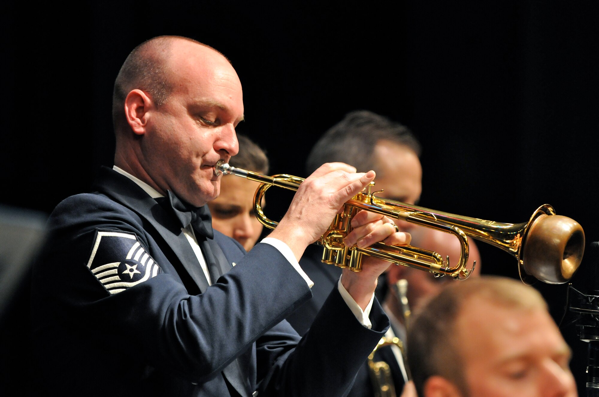Master Sgt. Rich Sigler, jazz trumpeter with the U.S. Air Force Band Airmen of Note, solos March 16 at Bassett High School, Bassett, Va. The Note is traveling through Virginia, Tennessee, Mississippi and Arkansas on it's 2011 Spring Tour. (U.S. Air Force photo by Airman 1st Class Tabitha N. Haynes)