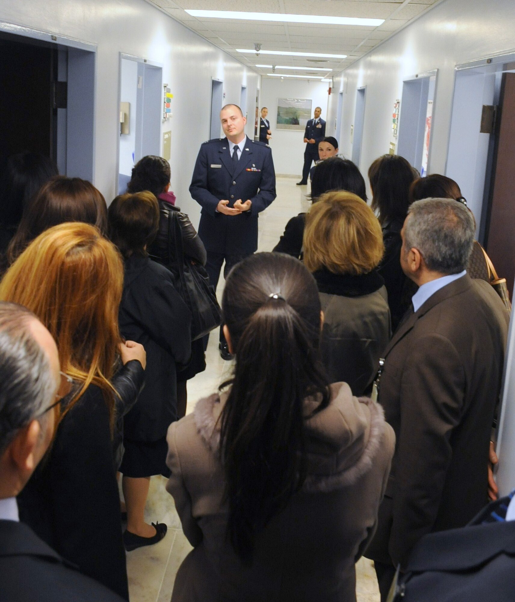 Capt. John Kitsteiner briefs providers from Acibadem and Metropark, two hospitals in Turkey, on family health procedures during the 39th Medical Group open house March 10, 2011, at Incirlik Air Base, Turkey. Captain Kitsteiner is a family practice physician assigned to the 39th MDG. (U.S. Air Force photo/Airman 1st Class Clayton Lenhardt)