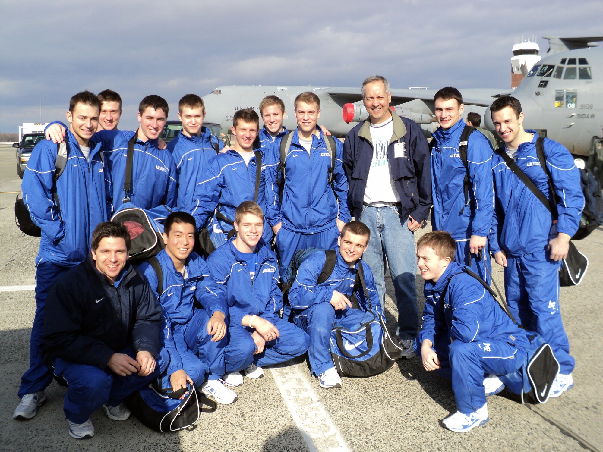 The Air Force Academy Men's Gymnastics Team gather with 439th Airlift Wing Commander Colonel Robert Swain before flying back to Colorado Springs after their team competition against Springfield College at Blake Arena, Springfield College, March 13. The Men's Gymnastics Team is now ranked 10th in the nation. They return to Blake Arena March 23-27 for both individual and team events. They will compete in the U.S. Gymnastics Championships March 25 at 7 p.m. The championship finals occur the following day, March 26, at 7 p.m., also at Blake Arena. (Courtesy photo)
                 