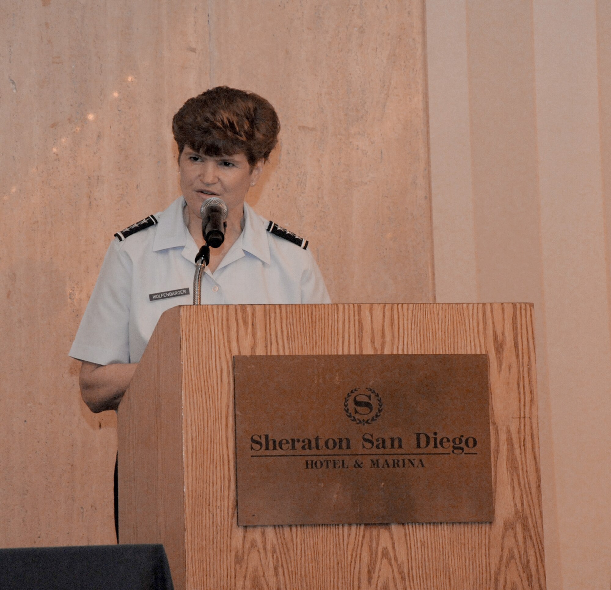 Lt. Gen. Janet Wolfenbarger speaks to more than 130 Airmen on her experiences and lessons learned during the Joint Women's Leadership Symposium March 16, 2011, in San Diego, Calif.  Military women from across the nation have gathered here March 15 and 16 to focus on professional development. General Wolfenbarger is the vice commander of the Air Force Materiel Command. (U.S. Air Force photo/Staff Sgt. Vanessa Young)