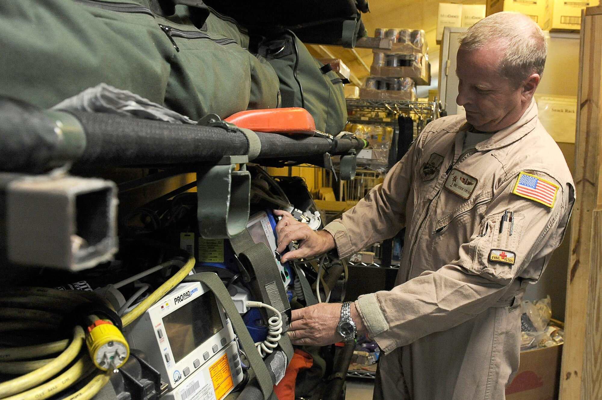 Master Sgt. Christopher Owens is the aeromedical evacuation operations team NCO in charge at the 455th Expeditionary Aeromedical Evacuation Flight. Sergeant Owens manages aeromedical evacuation stage operations and supervises launch and recovery of aeromedical evacuation missions at Bagram Airfield, Afghanistan. (U.S. Air Force photo by/ Master Sgt. Jeromy K. Cross) 