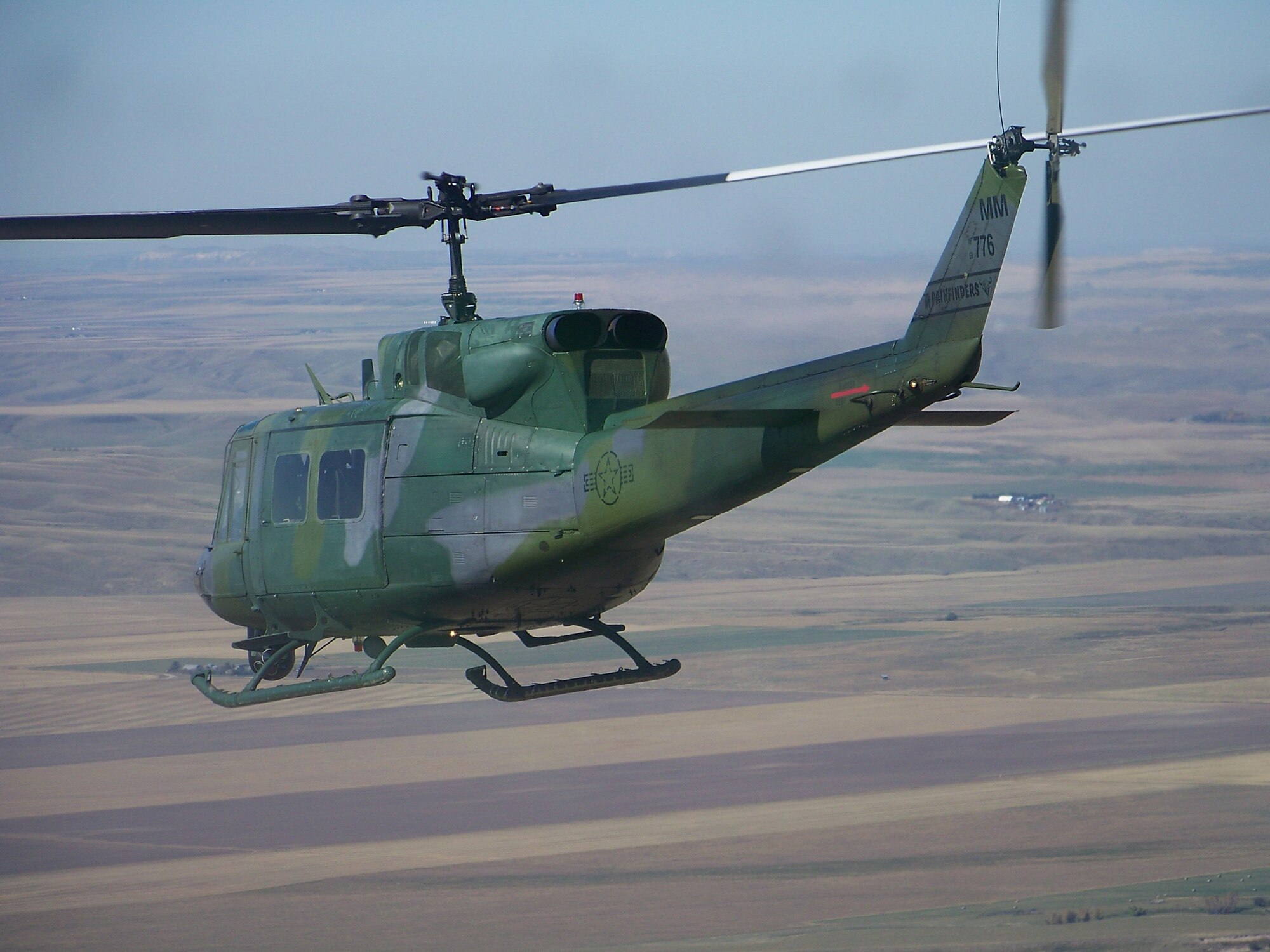 40th Helicopter Squadron flight crews fly a UH-1N Huey Iroquois over Montana's landscape.  (Courtesy Photo)