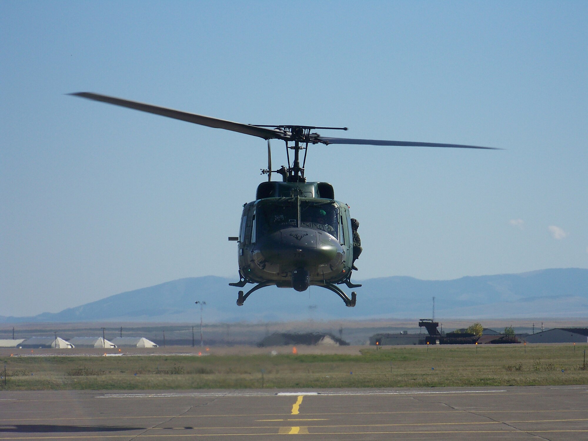 A 40th Helicopter Squadron flight crew lands at Malmstrom Air Force Base.  (Courtesy Photo)