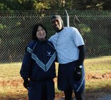 Maj. Janette Thode poses with Tech. Sgt. Kevin Davis after the wing's semi-annual Warrior Run last November. Maj. Thode is the newest blogger highlighting fitness success and challenges on the Four for Fitness blog. (USAF photo courtesy of 916PA)